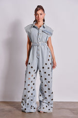 PLAY YOUR CARDS RIGHT DENIM JUMPSUIT WITH GROMMETS IN LIGHT WASH