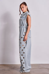 PLAY YOUR CARDS RIGHT DENIM JUMPSUIT WITH GROMMETS IN LIGHT WASH