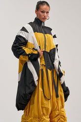 DON'T MIND ME HIGH LOW WINDBREAKER IN YELLOW