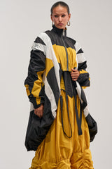 DON'T MIND ME HIGH LOW WINDBREAKER IN YELLOW