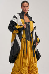 DON'T MIND ME HIGH LOW WINDBREAKER IN YELLOW