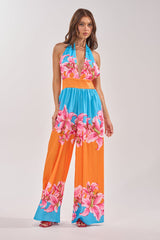 ON VACA TIME HALTER FLORAL PRINT JUMPSUIT
