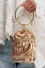 NEVER CAGED LUXE BAG