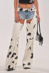 MOO OVER COW PRINT FAUX LEATHER CHAPS
