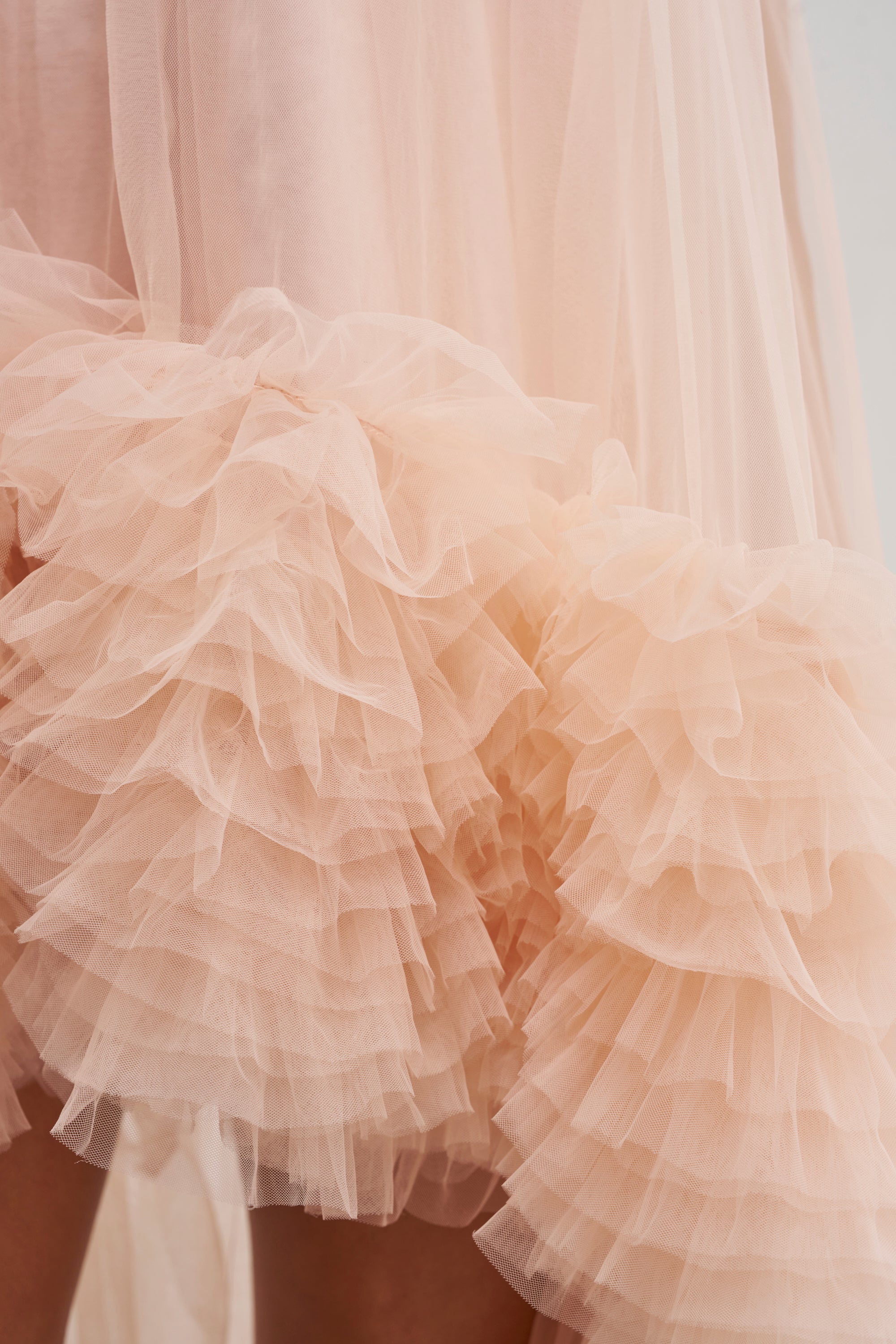 ARI TULLE RUFFLE HIGH LOW MINI DRESS IN BLUSH