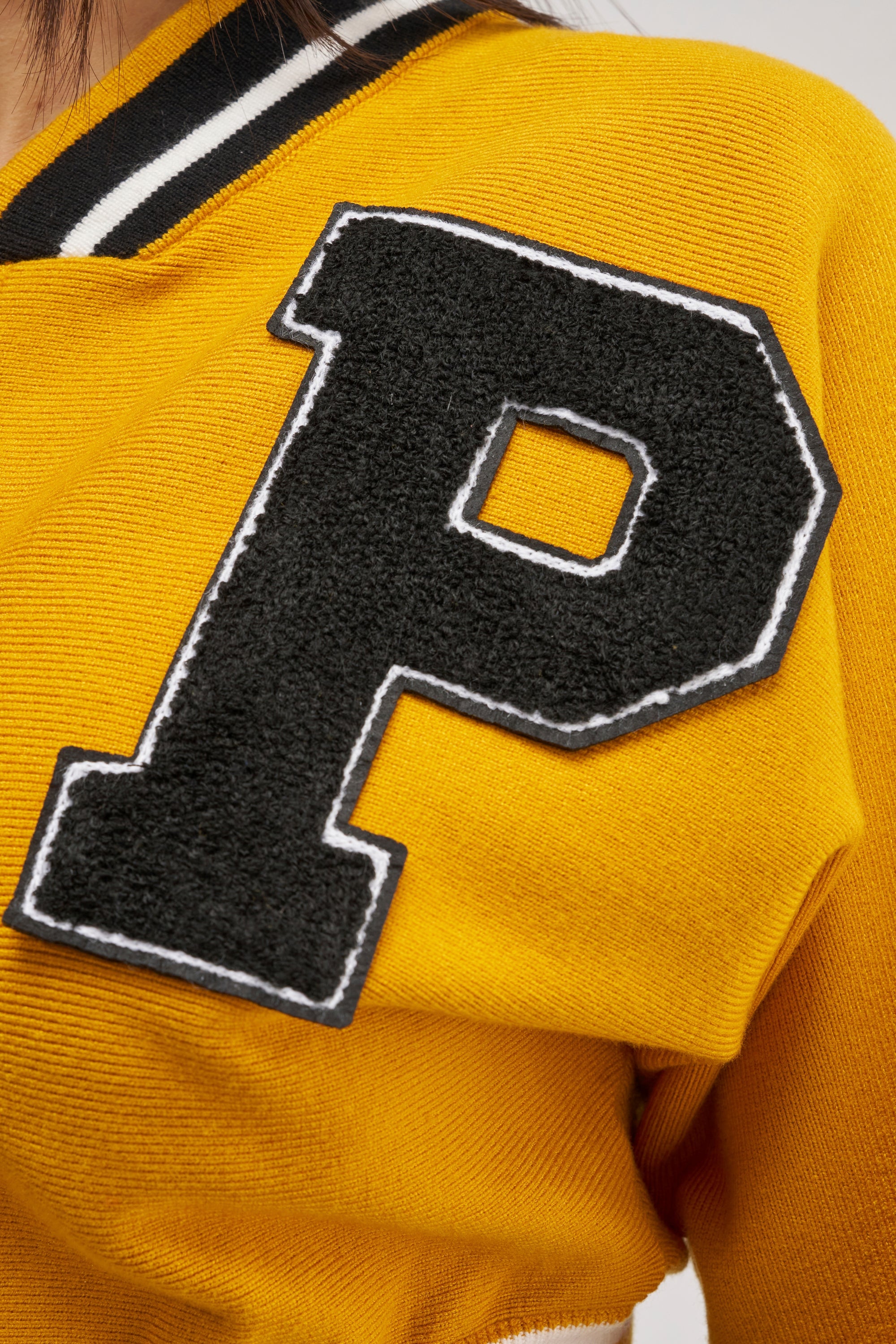 VARSITY TEAM BUTTON DOWN SWEATER IN MUSTARD