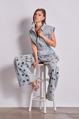 PLAY YOUR CARDS RIGHT DENIM JUMPSUIT WITH GROMMETS IN LIGHT WASH