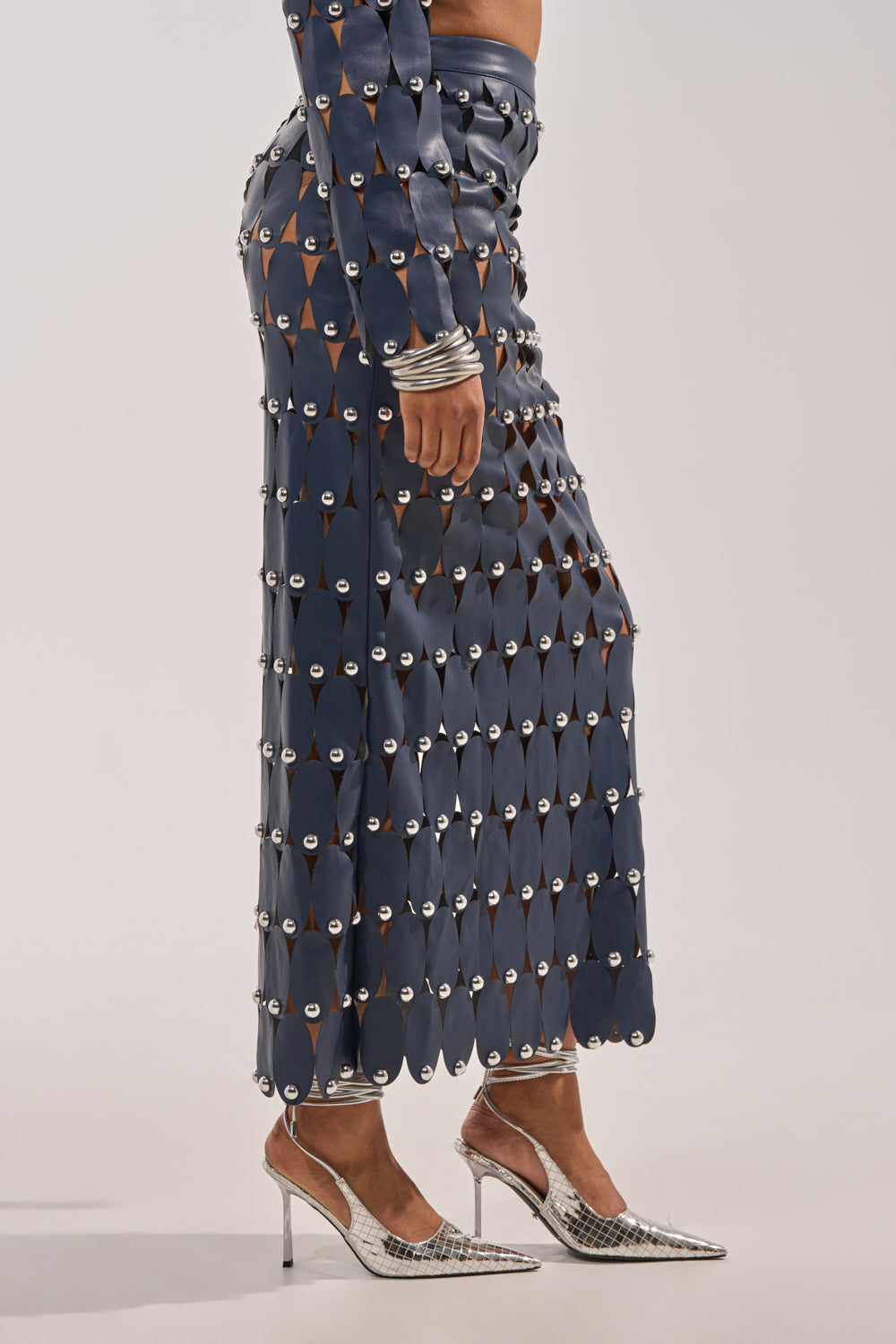 THE SNEAK PEEK STUDDED PU MIDI SKIRT IN NAVY