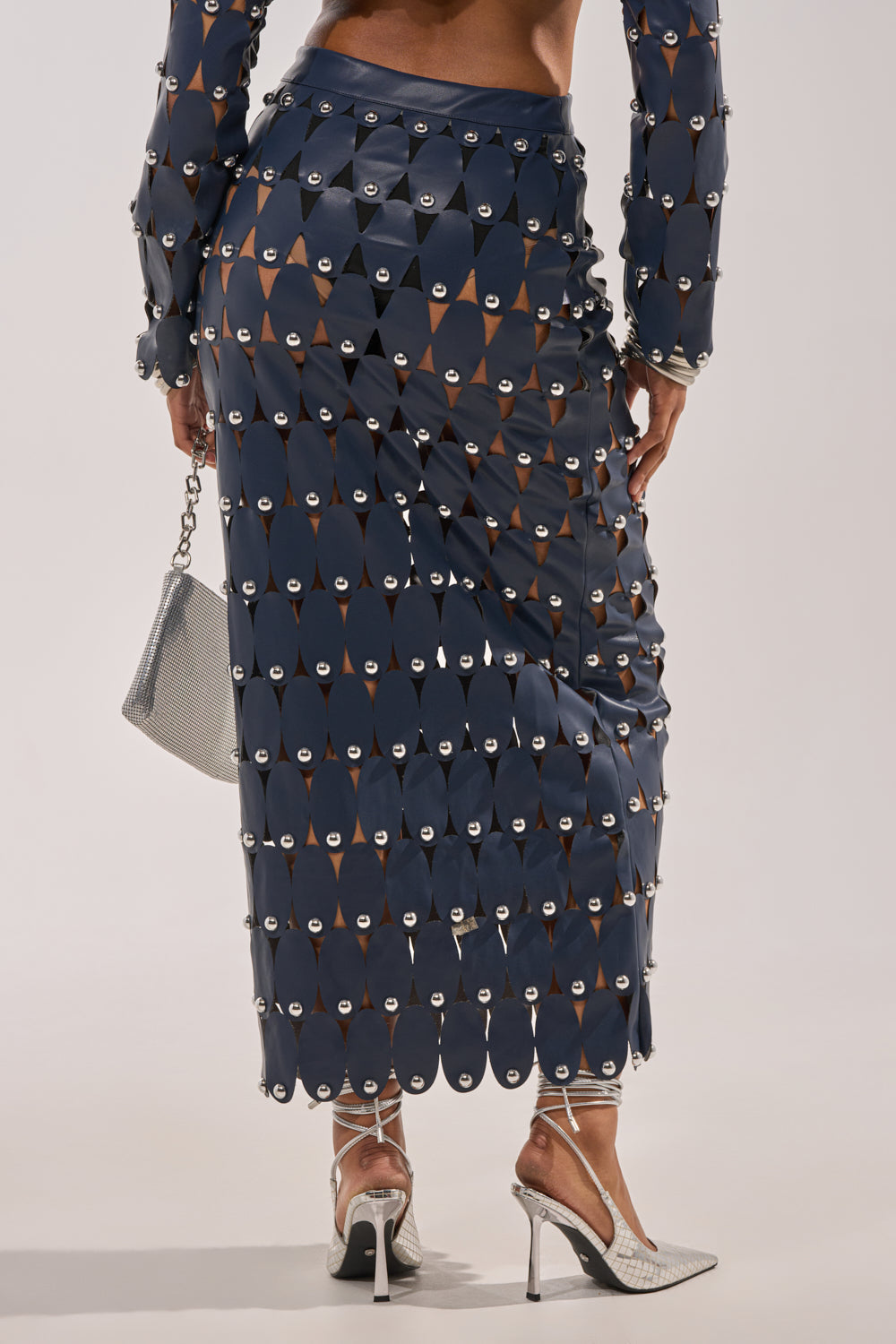 THE SNEAK PEEK STUDDED PU MIDI SKIRT IN NAVY
