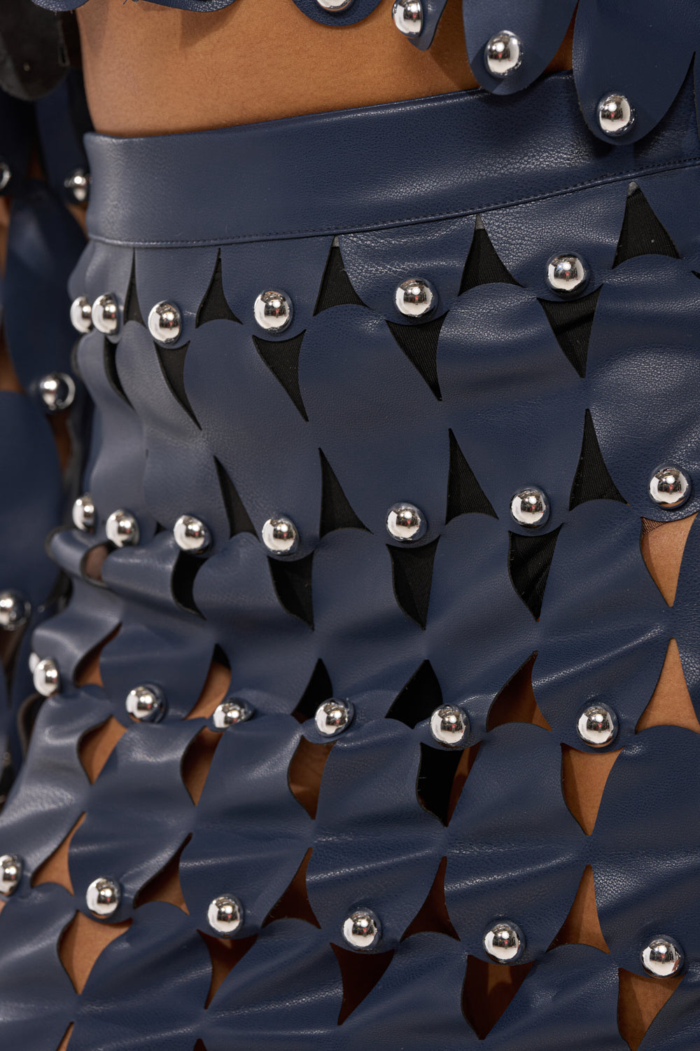 THE SNEAK PEEK STUDDED PU MIDI SKIRT IN NAVY