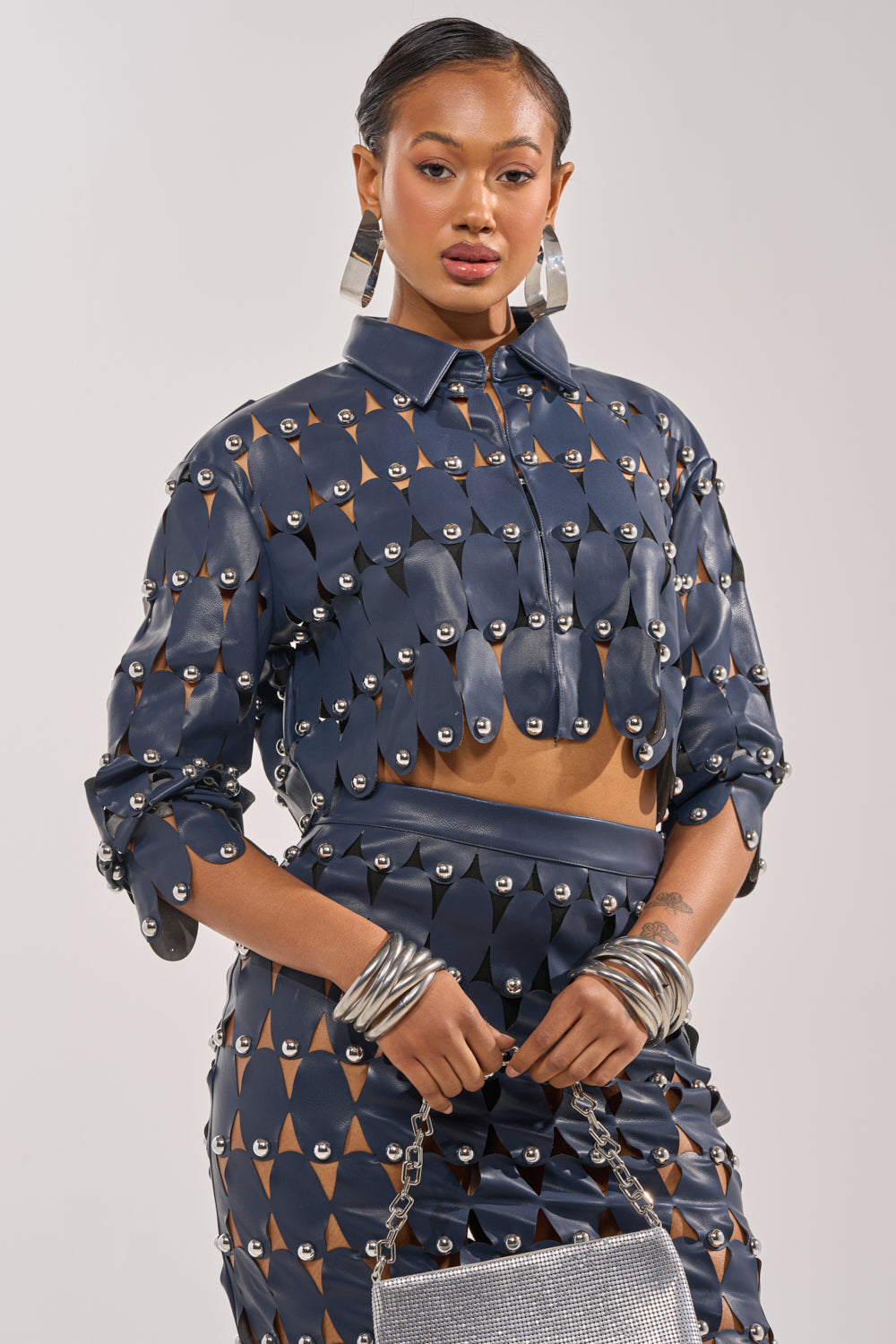 THE SNEAK PEEK STUDDED PU CROP CARDIGAN IN NAVY