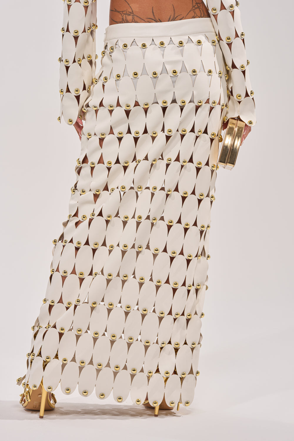 THE SNEAK PEEK STUDDED PU MIDI SKIRT IN WHITE