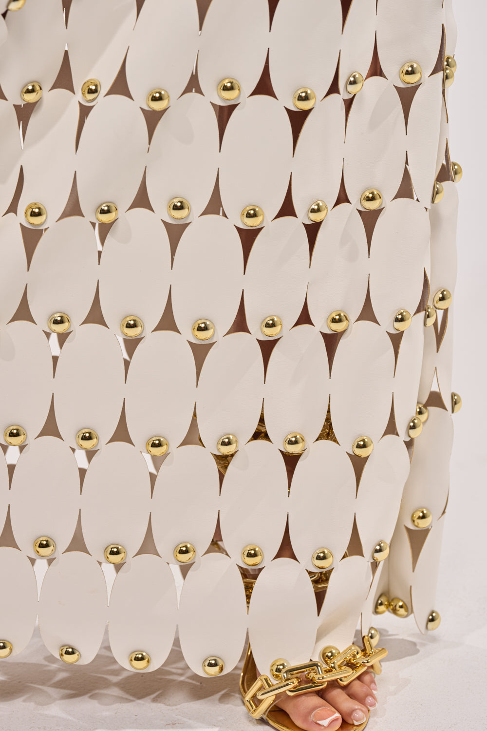 THE SNEAK PEEK STUDDED PU MIDI SKIRT IN WHITE