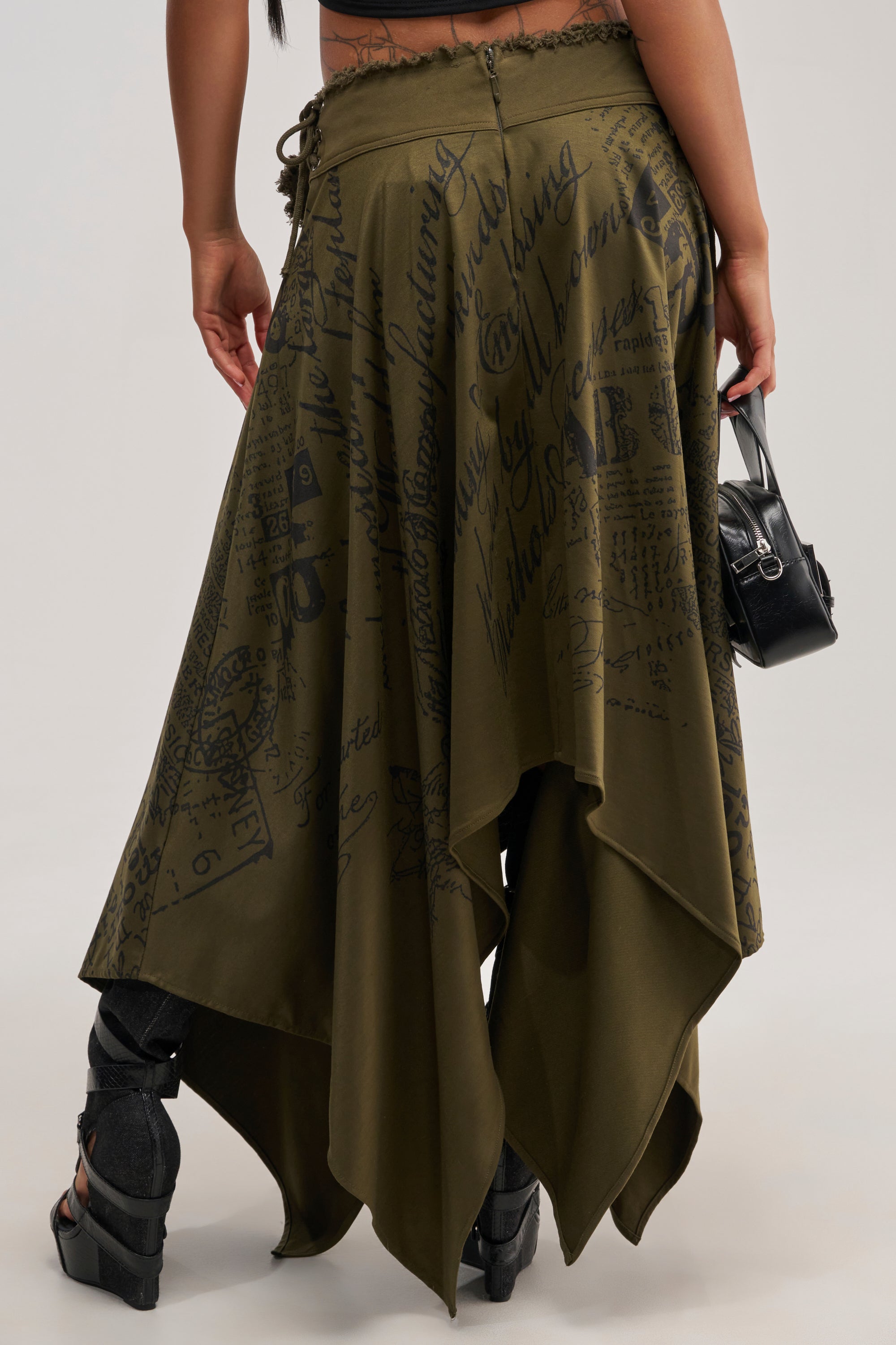 NONE OF YOUR CONCERN MIDI SKIRT