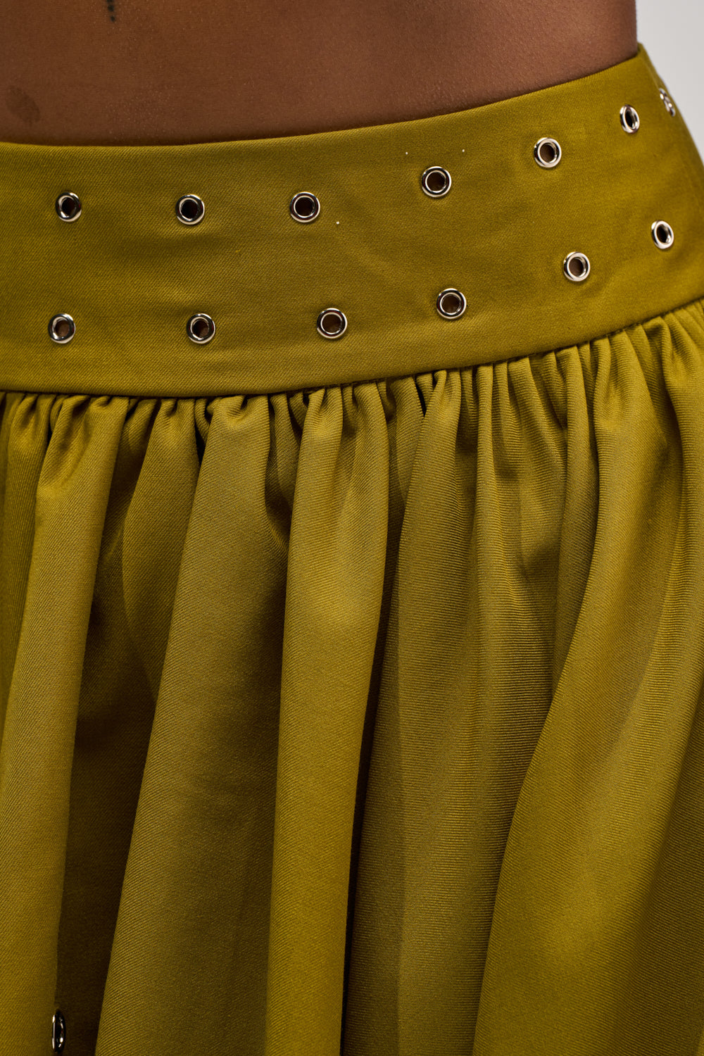 YOUNG AND FREE MINI SKIRT WITH GROMMETS
