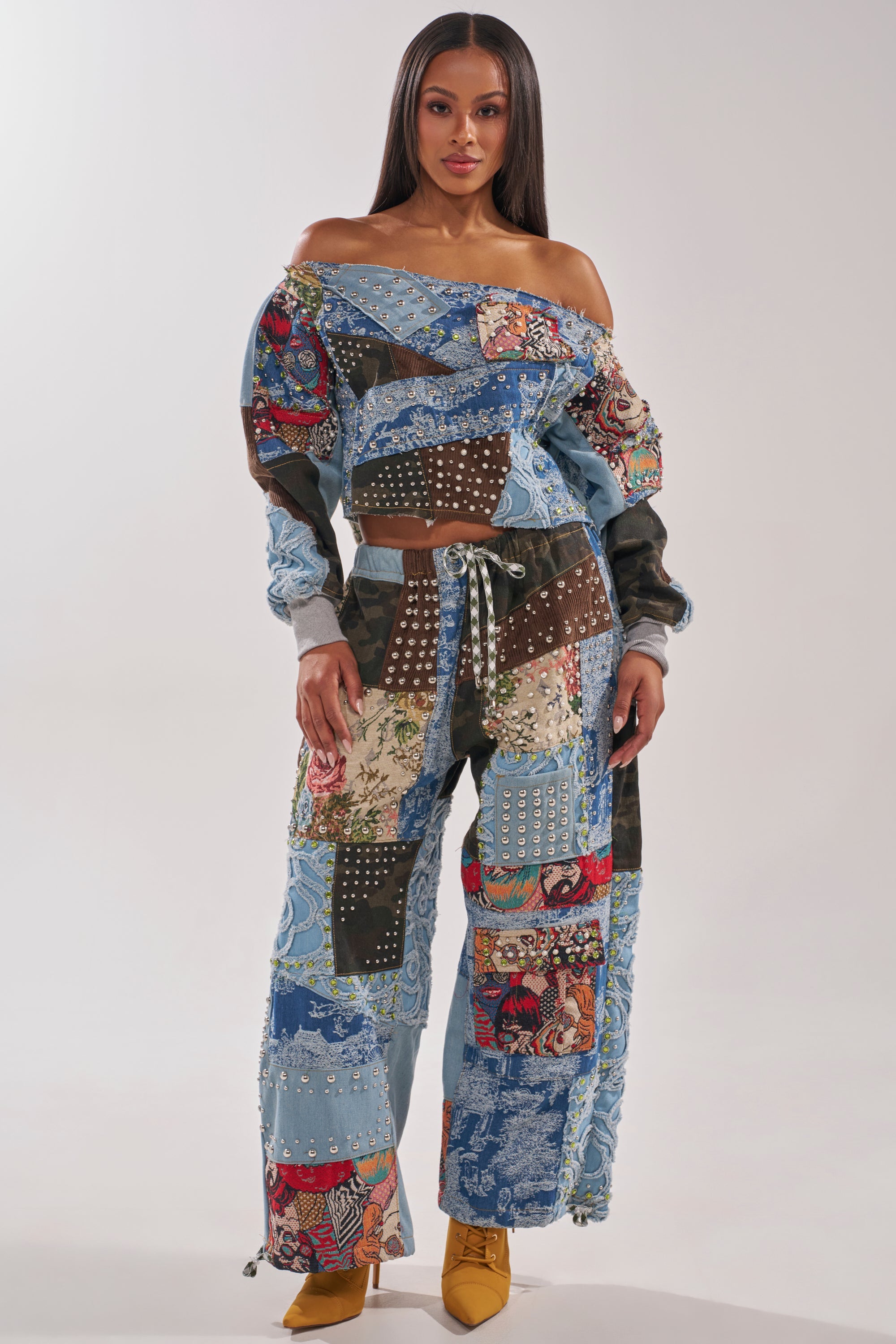 CALL ME CRAZY PATCHWORK OFF THE SHOULDER SWEATSHIRT
