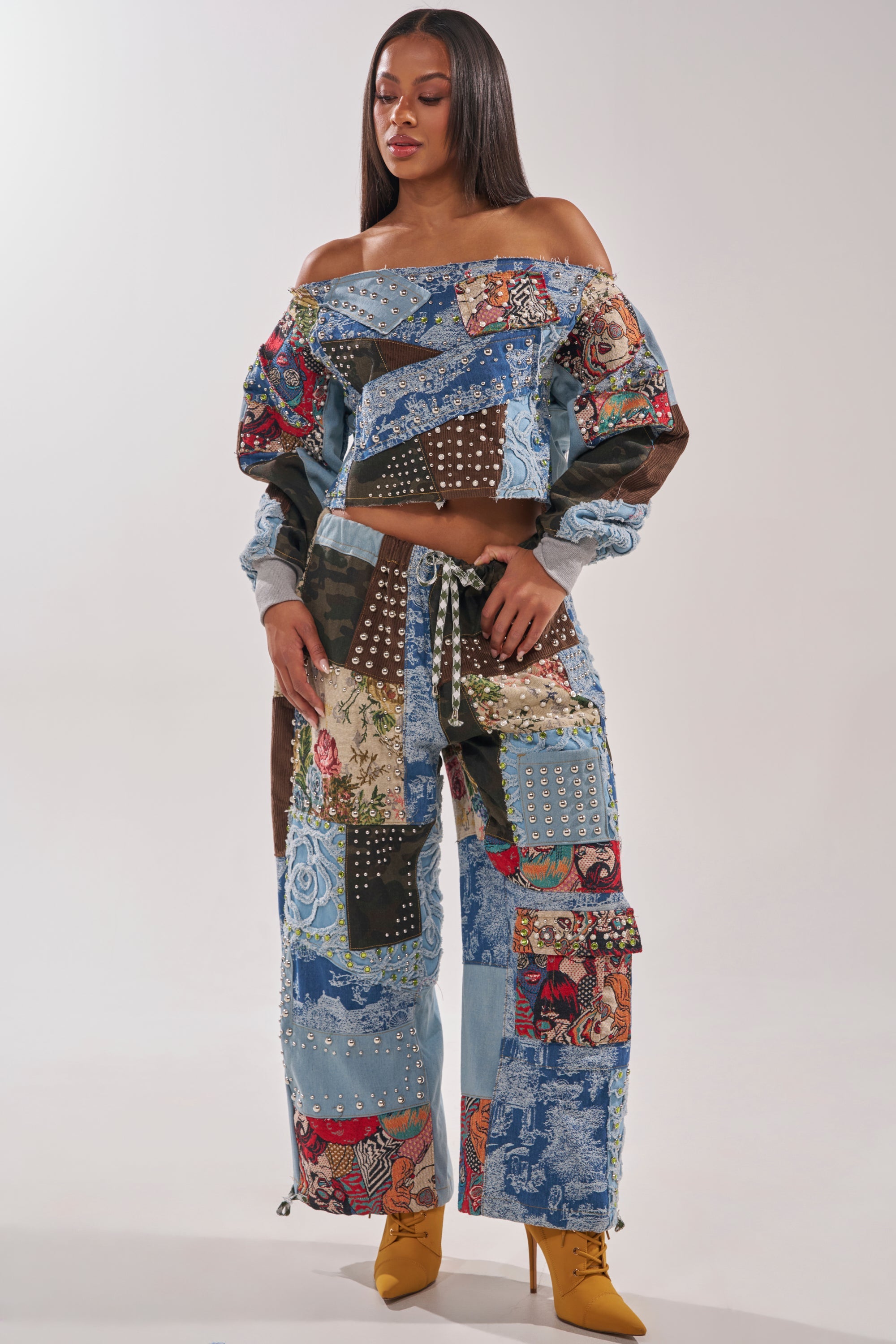 CALL ME CRAZY PATCHWORK OFF THE SHOULDER SWEATSHIRT