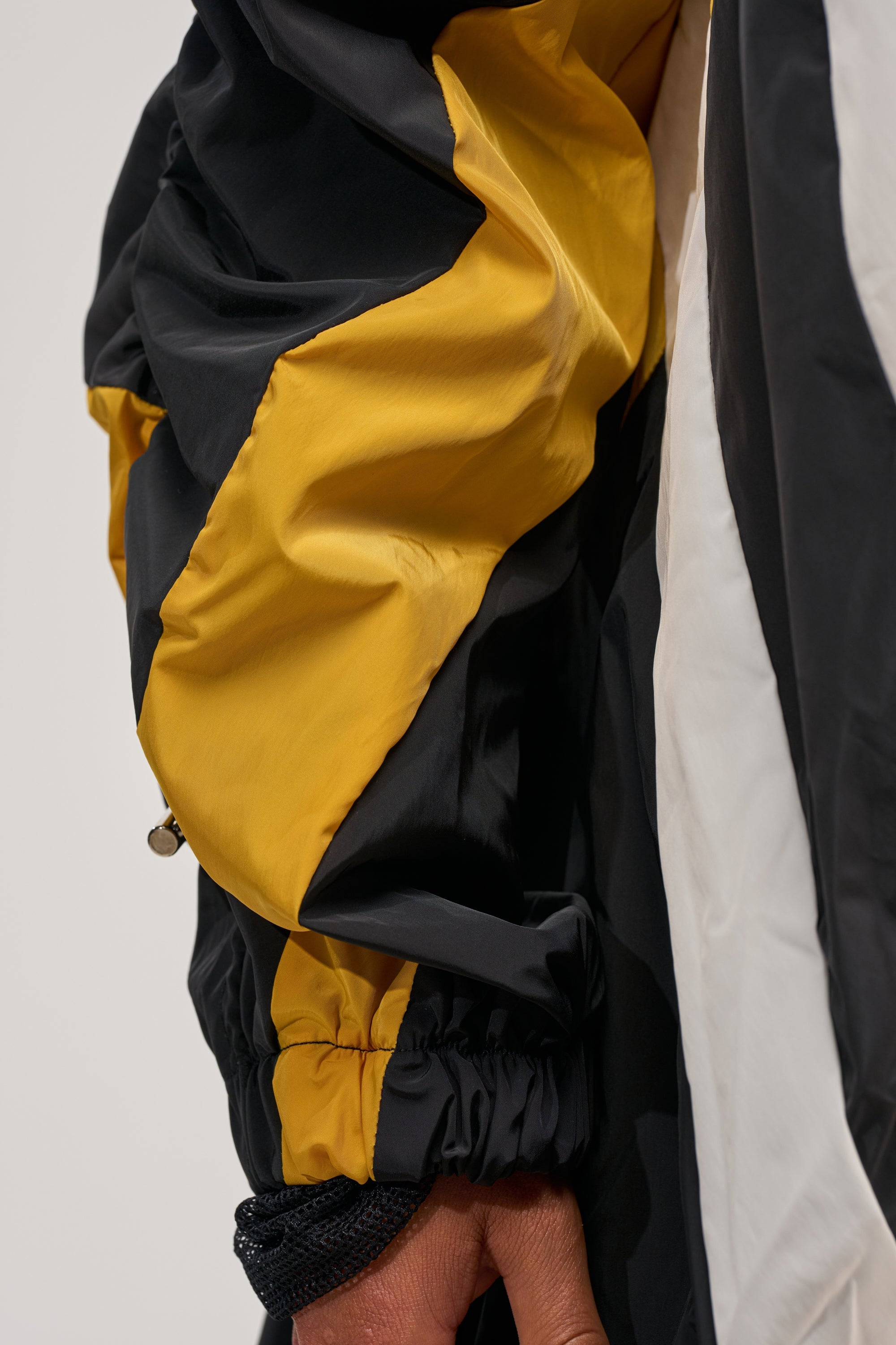 DON'T MIND ME HIGH LOW WINDBREAKER IN YELLOW