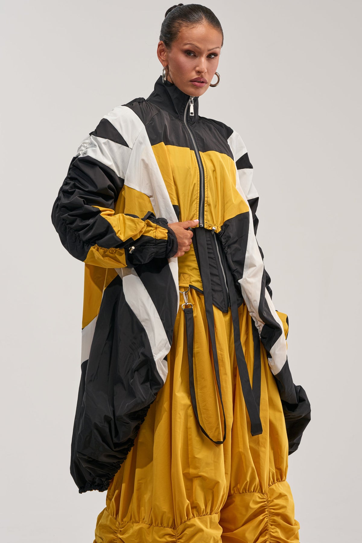 DON'T MIND ME HIGH LOW WINDBREAKER IN YELLOW