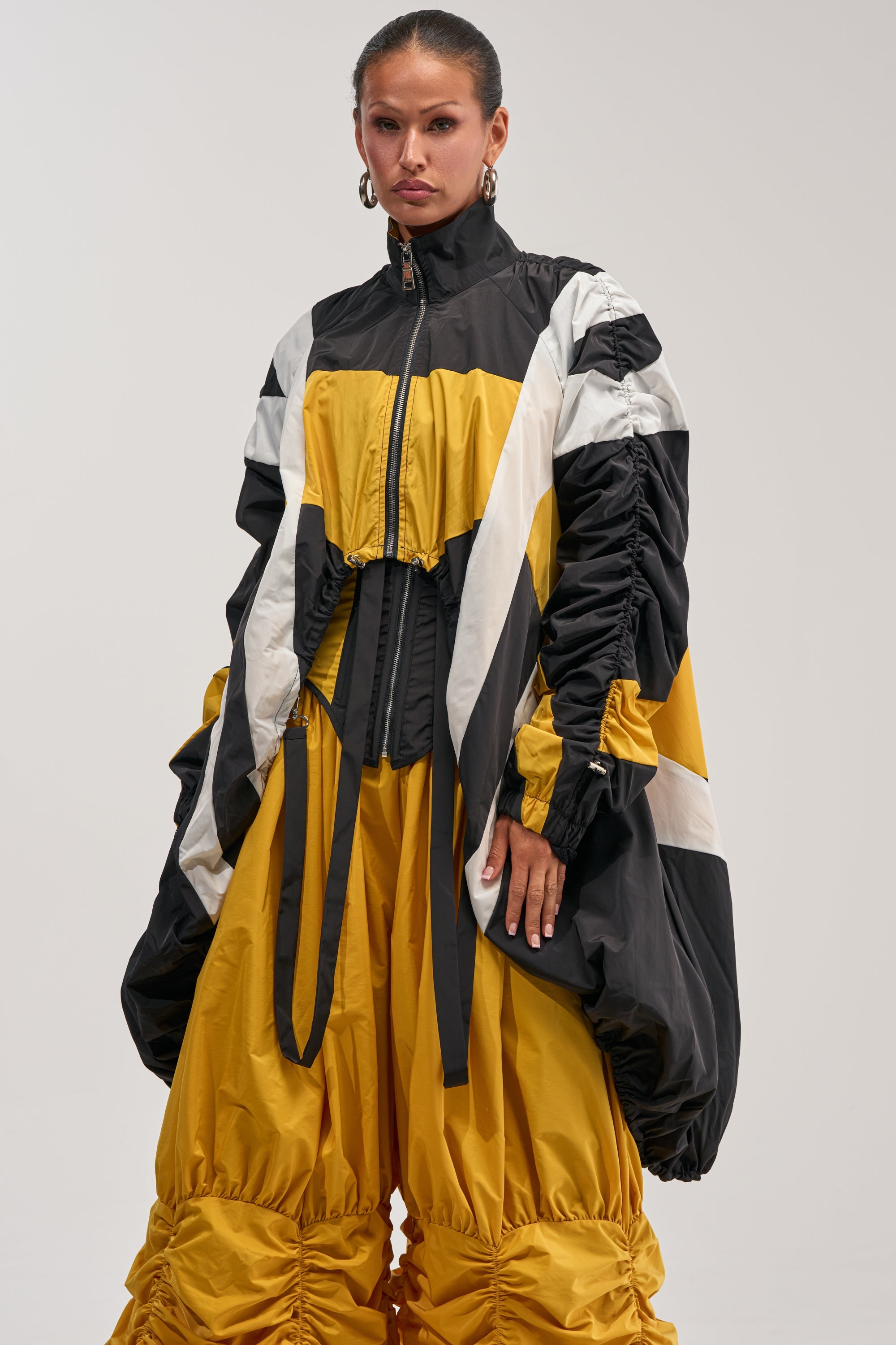 DON'T MIND ME HIGH LOW WINDBREAKER IN YELLOW