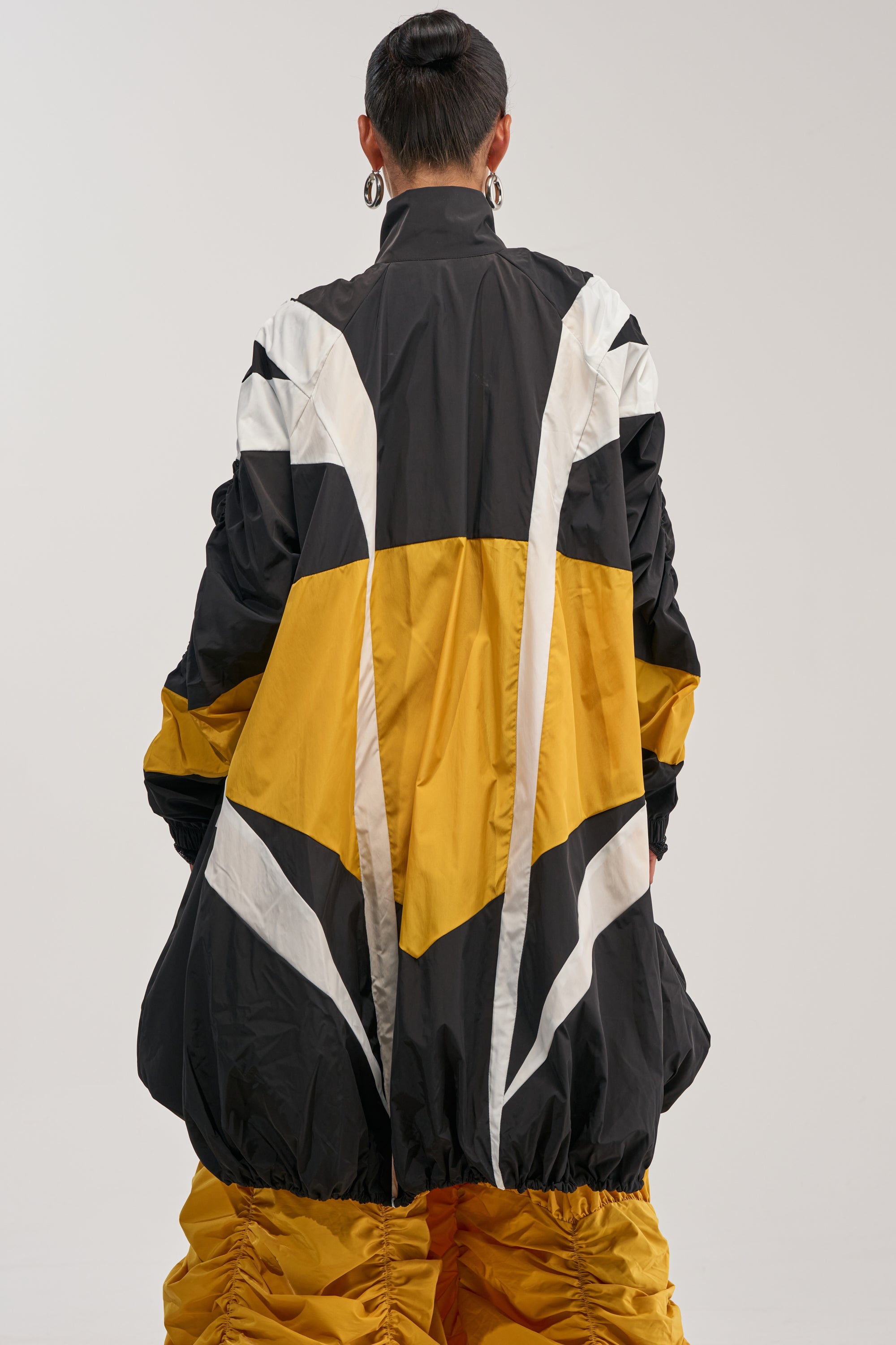 DON'T MIND ME HIGH LOW WINDBREAKER IN YELLOW