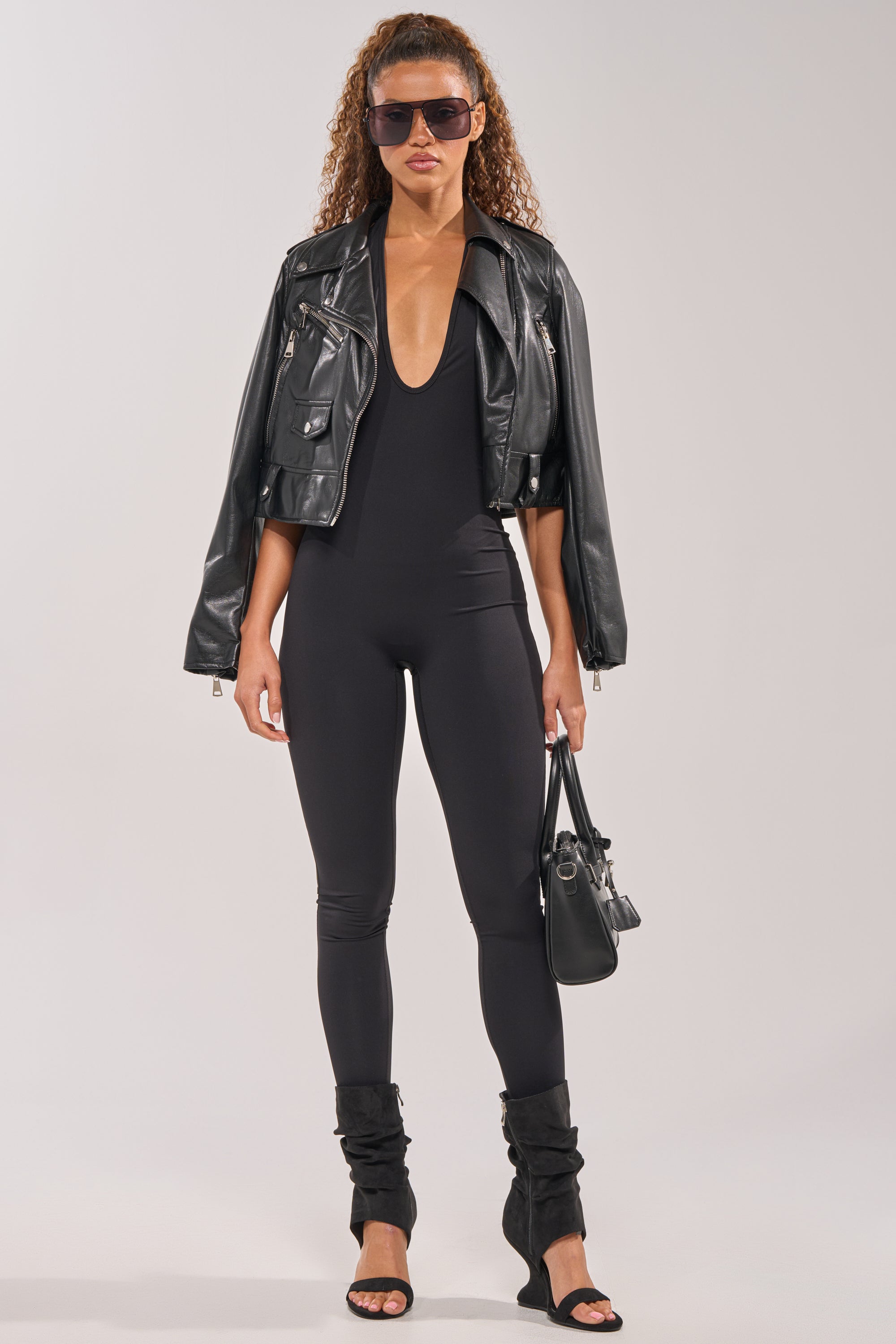 HIGH STANDARDS SLEEVELESS HALTER JUMPSUIT