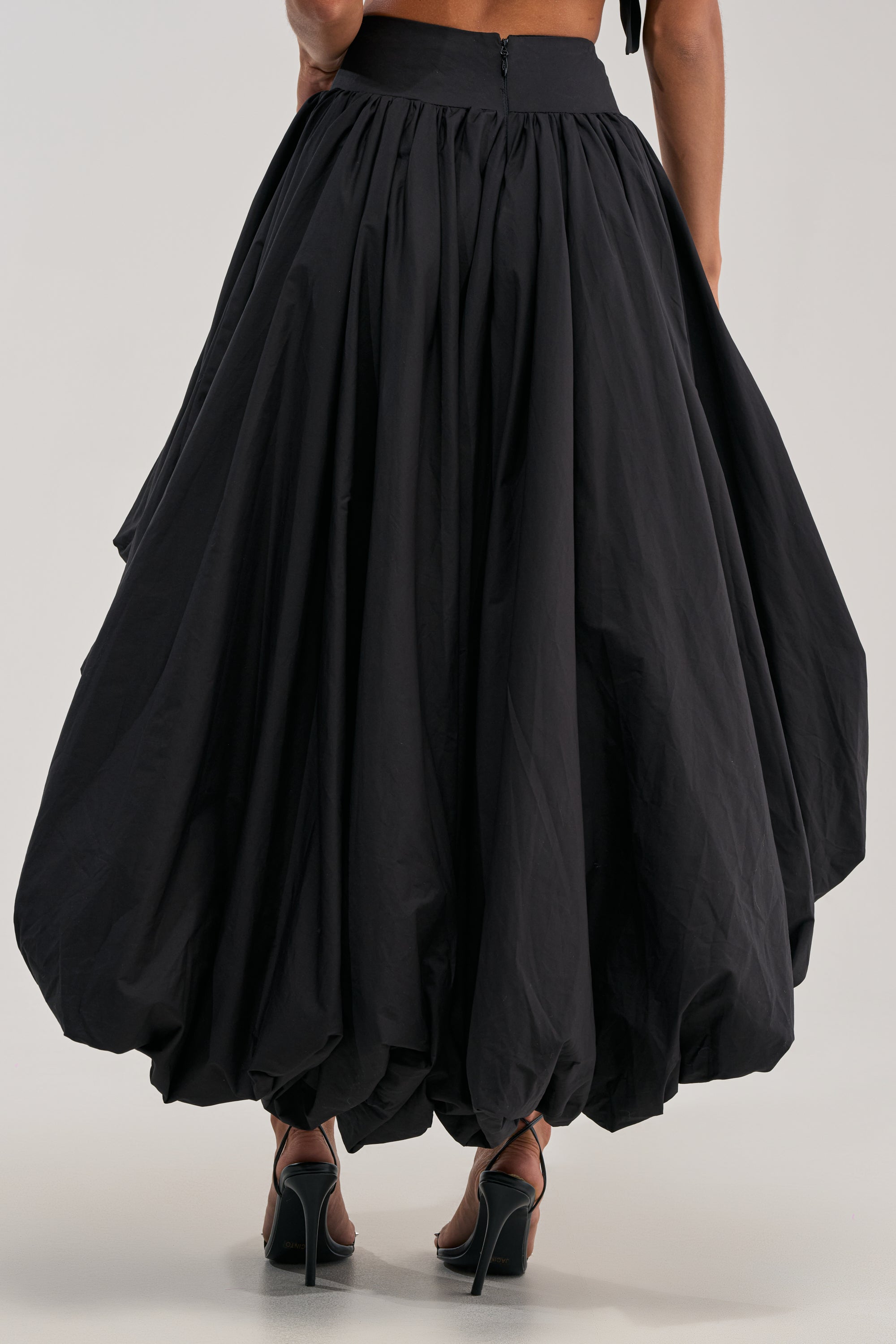 THE BIGGER THE BETTER HIGH LOW MAXI SKIRT IN BLACK