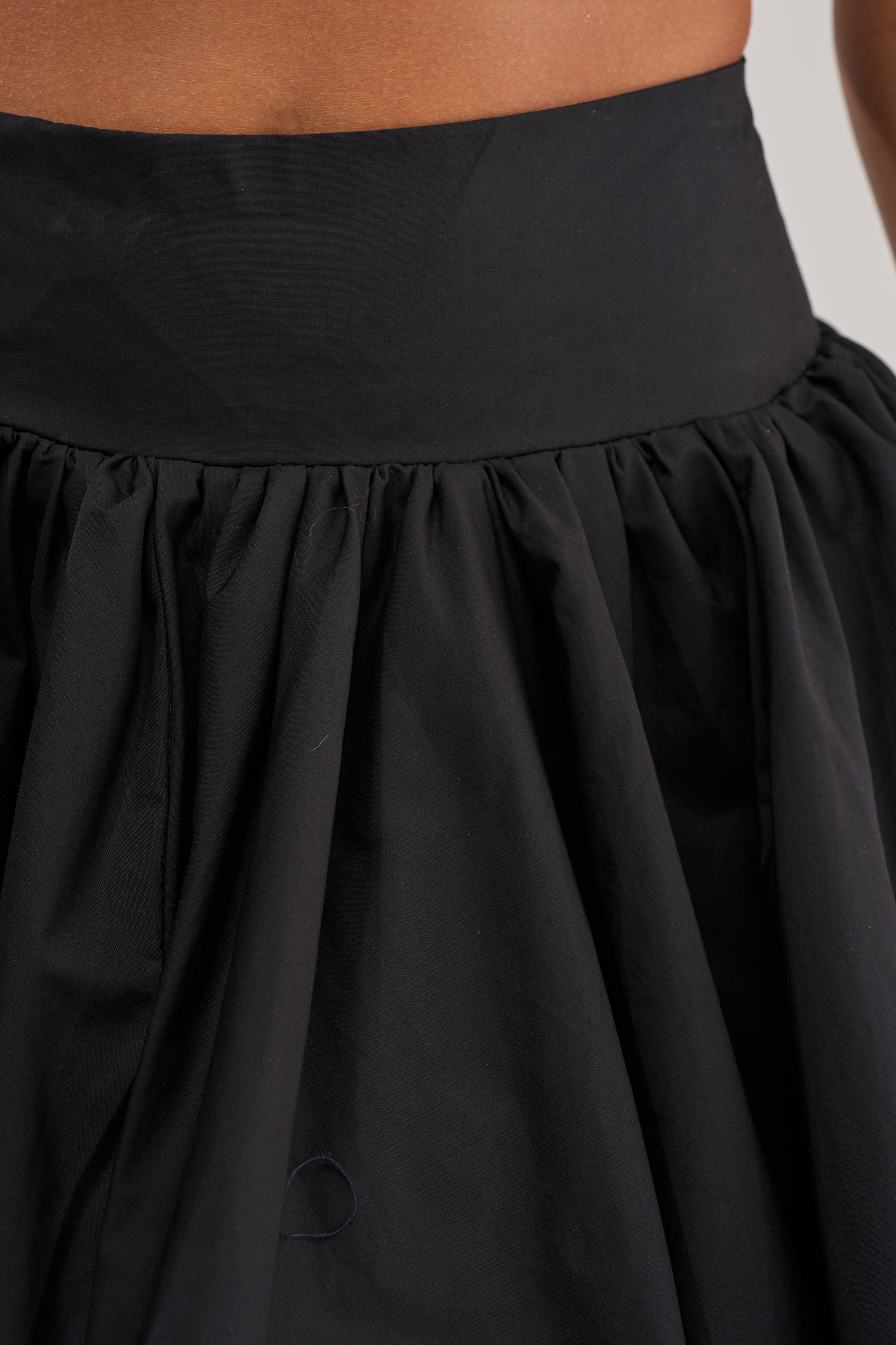 THE BIGGER THE BETTER HIGH LOW MAXI SKIRT IN BLACK
