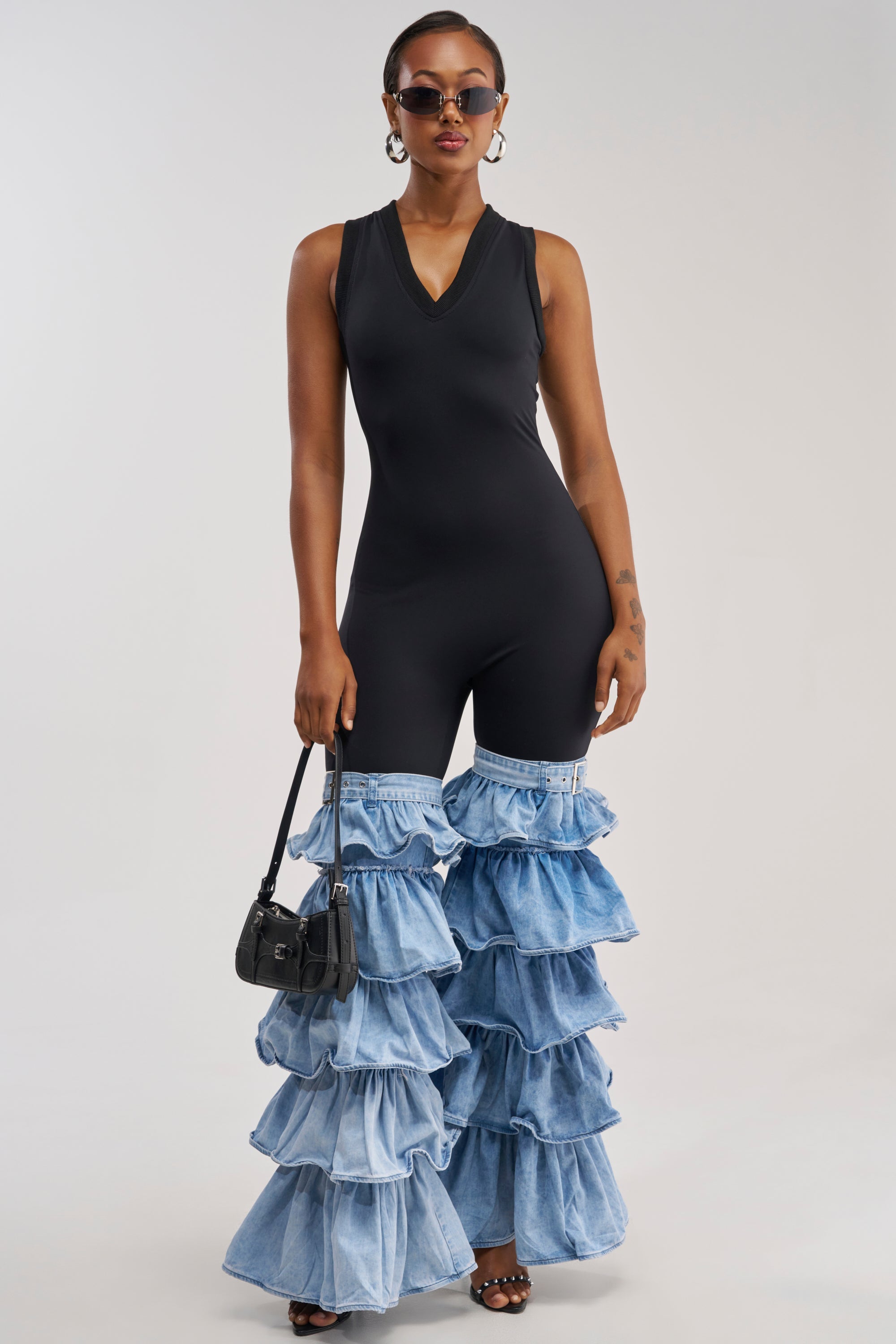 ELEVATED BASICS BODYCON JUMPSUIT WITH RUFFLE DENIM LEG