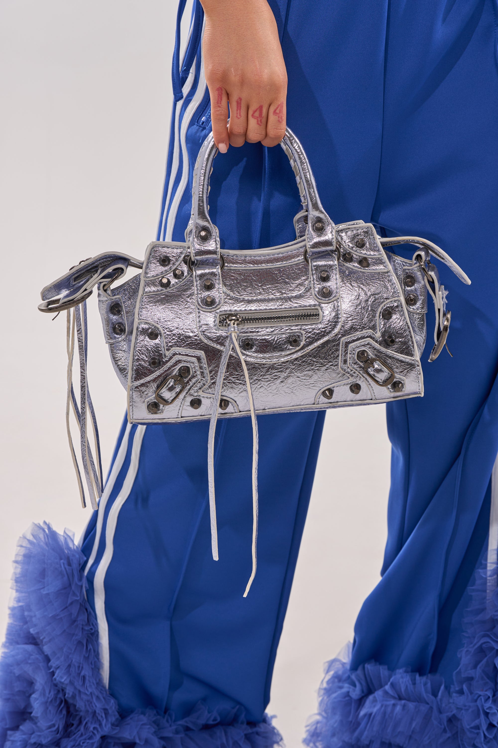 TO THE CITY PURSE