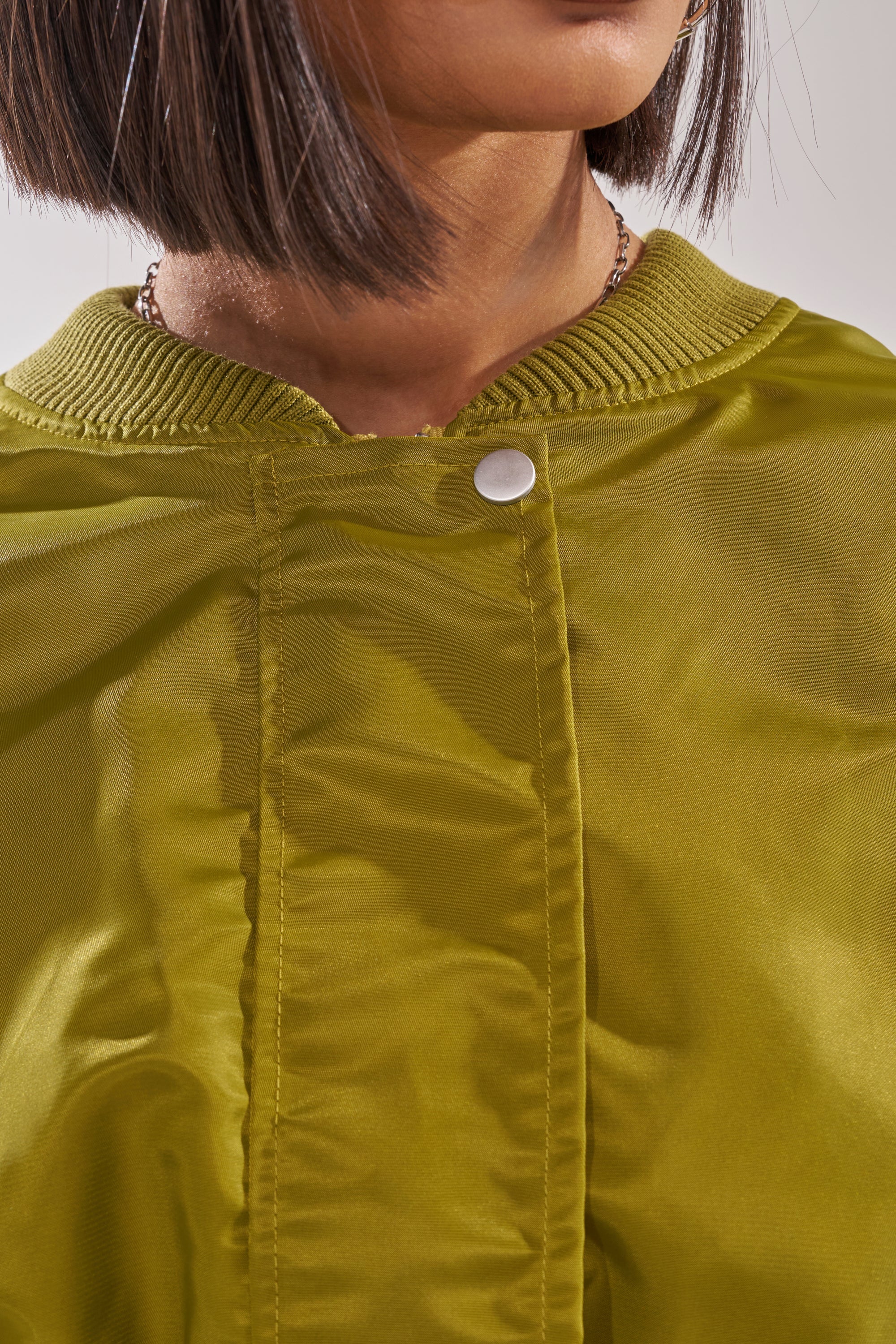 TAKE IT EASY CROPPED BOMBER IN GREEN