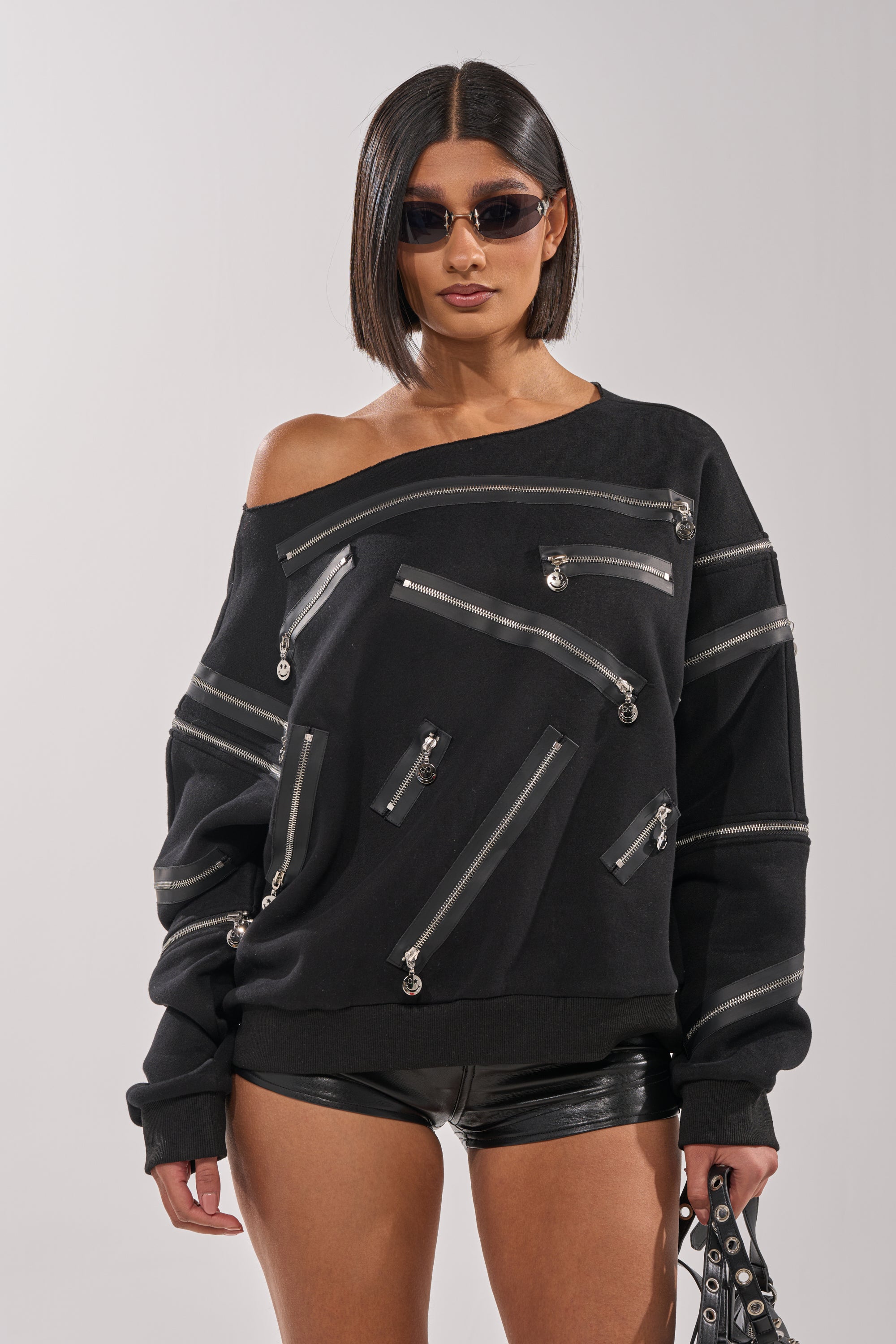 UN-ZIP ME OFF THE SHOULDER SWEATSHIRT
