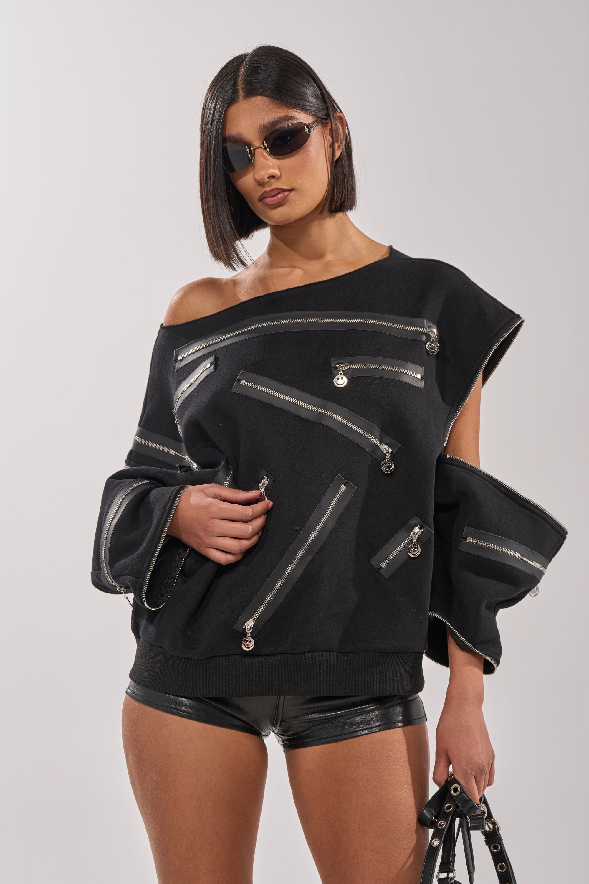 UN-ZIP ME OFF THE SHOULDER SWEATSHIRT