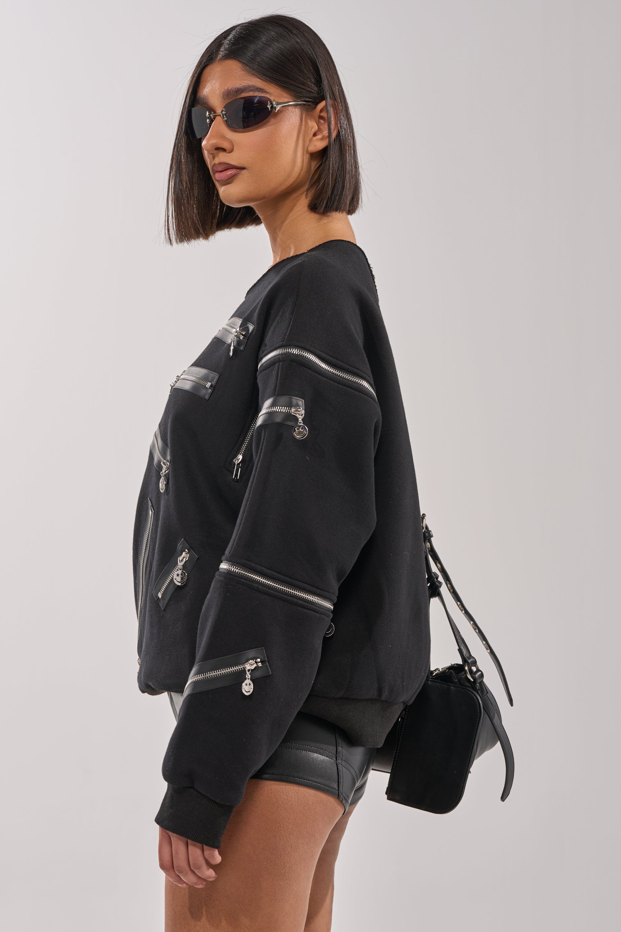 UN-ZIP ME OFF THE SHOULDER SWEATSHIRT