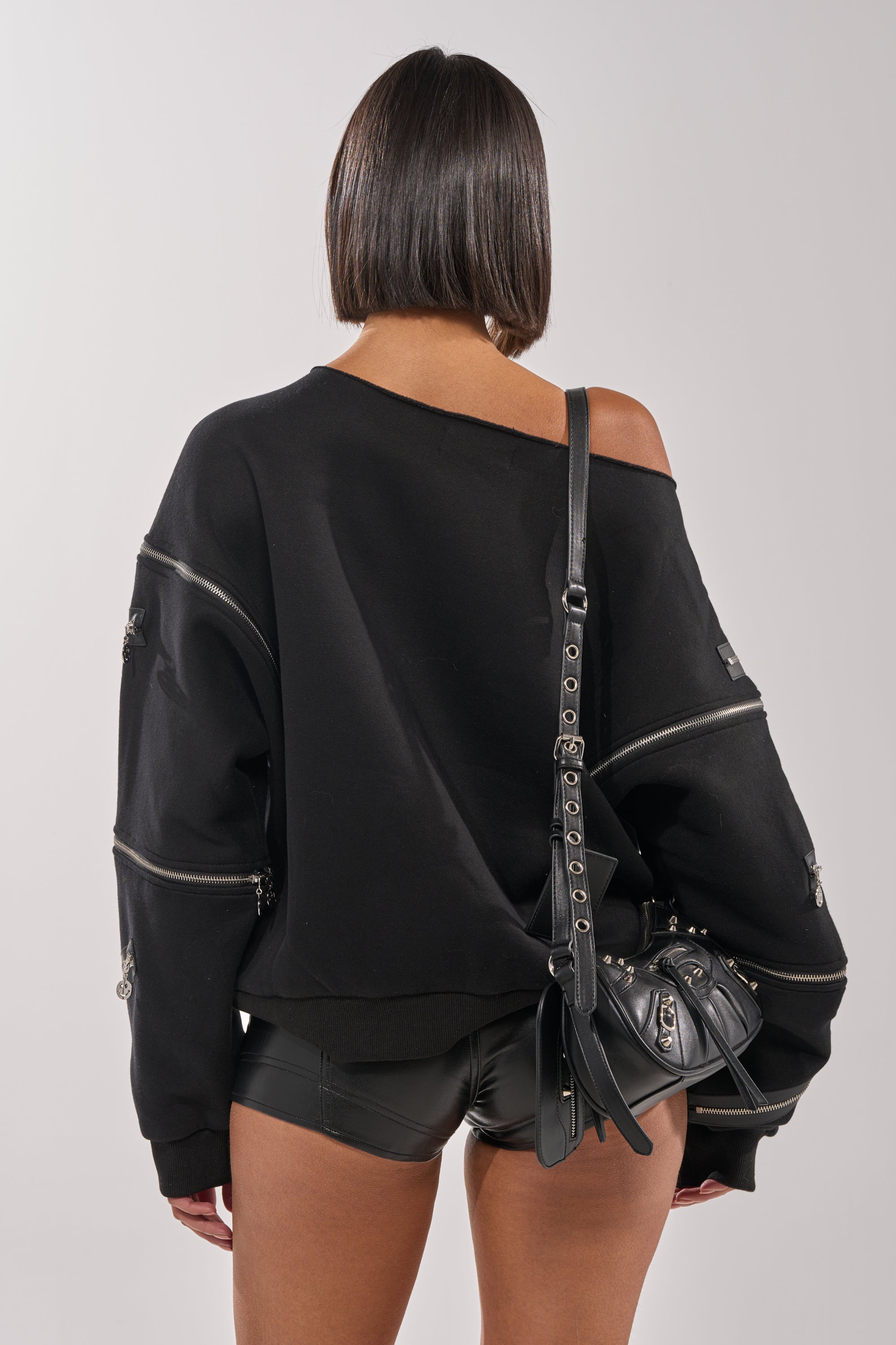 UN-ZIP ME OFF THE SHOULDER SWEATSHIRT