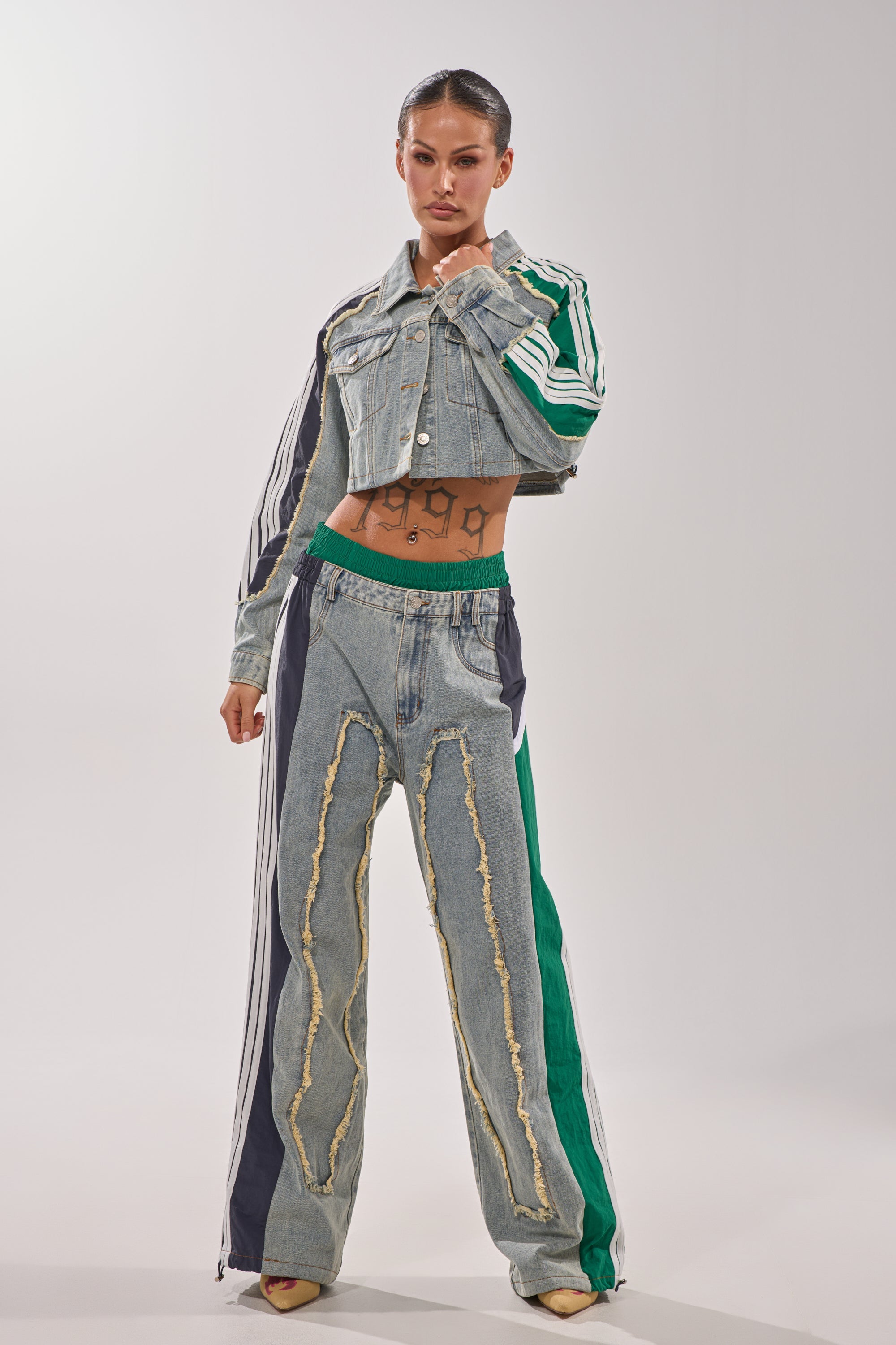 ALL AROUND THE WORLD PATCHWORK DENIM JOGGER PANT IN GREEN MULTI