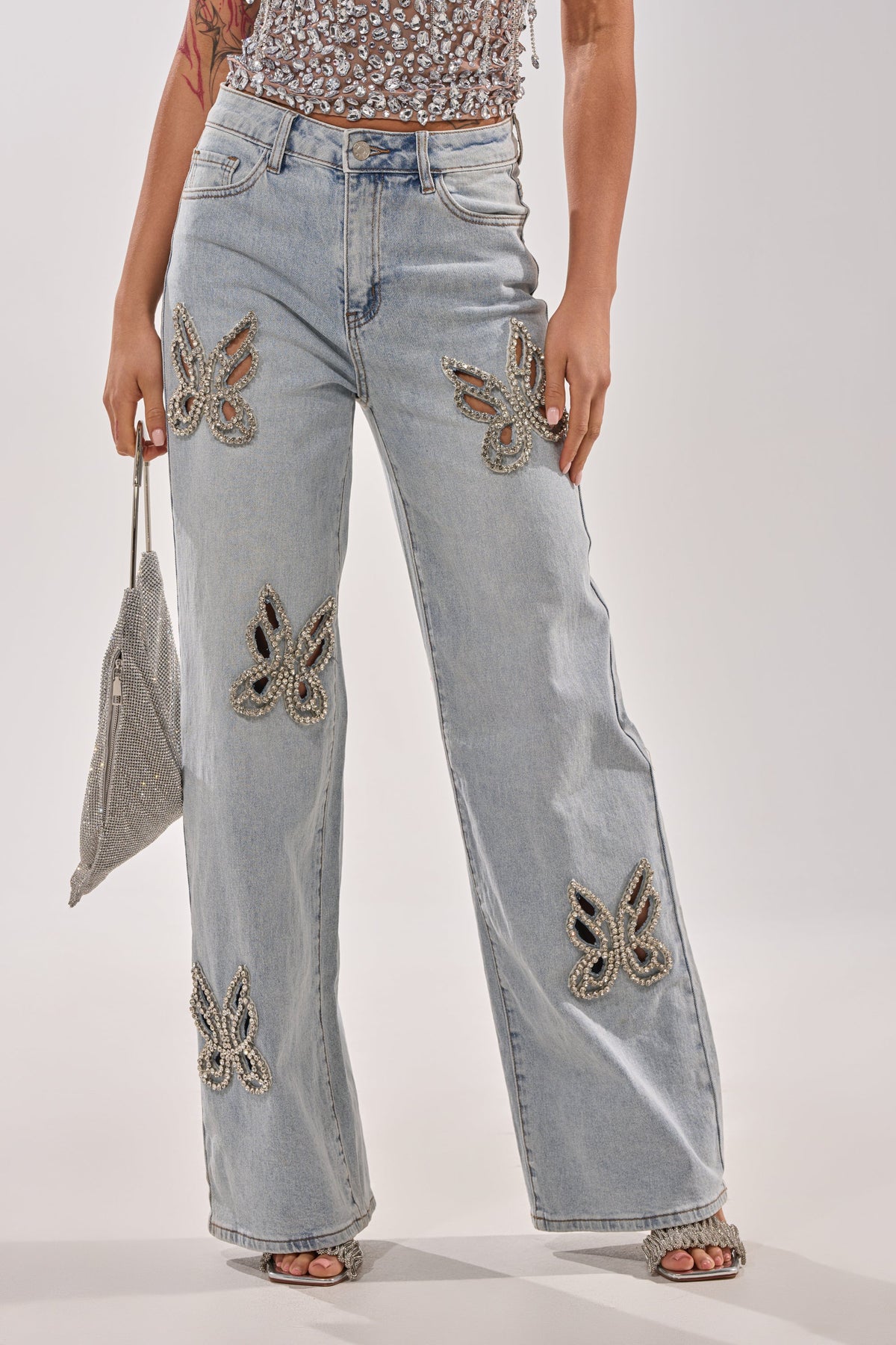 RHINESTONE BUTTERFLY CUTOUT DENIM JEANS