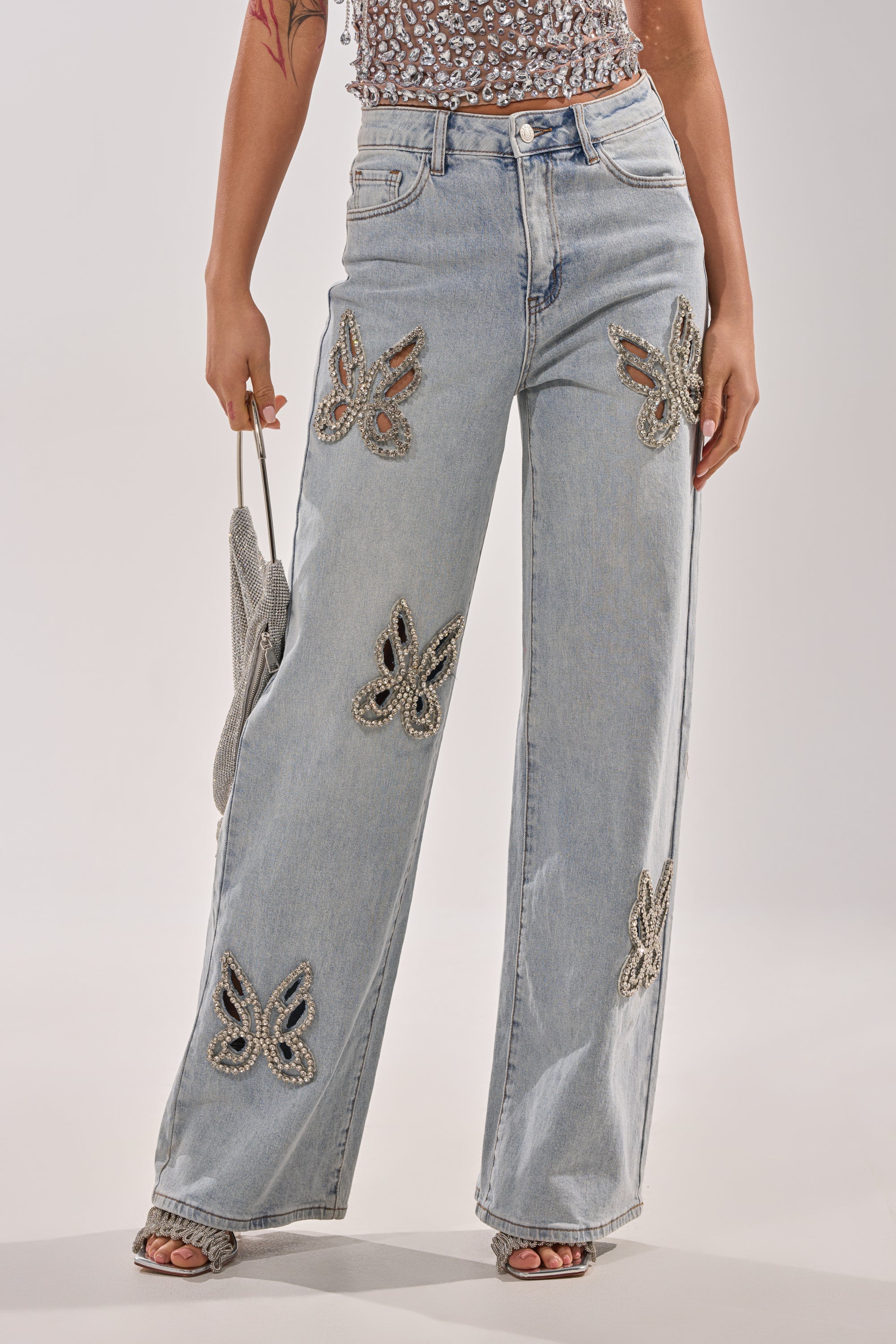 RHINESTONE BUTTERFLY CUTOUT DENIM JEANS