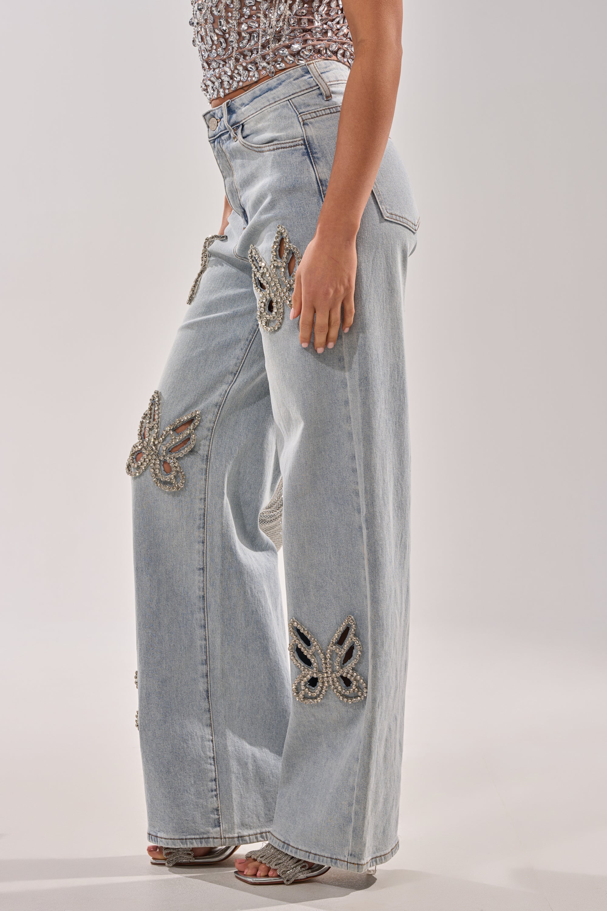 RHINESTONE BUTTERFLY CUTOUT DENIM JEANS