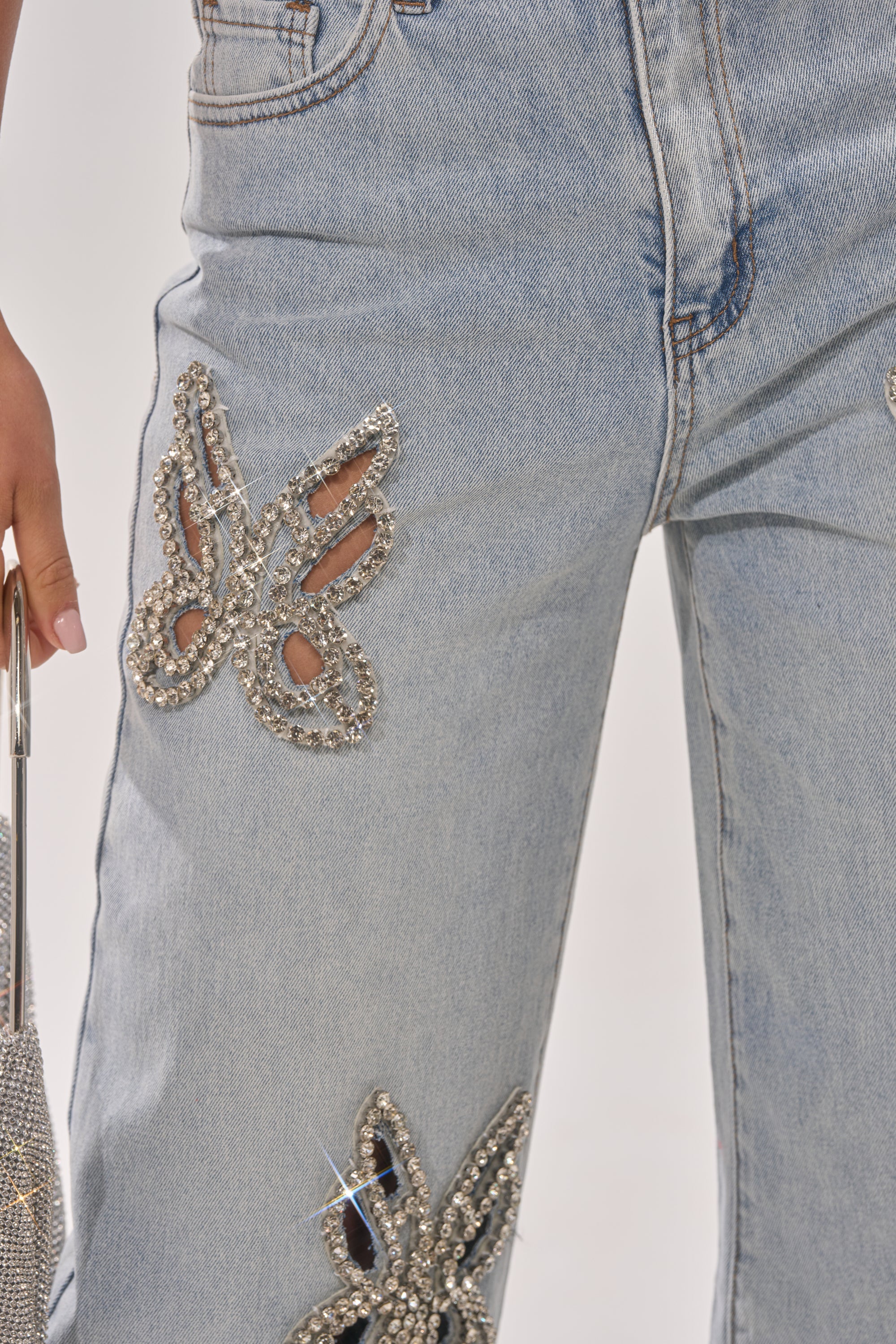 RHINESTONE BUTTERFLY CUTOUT DENIM JEANS