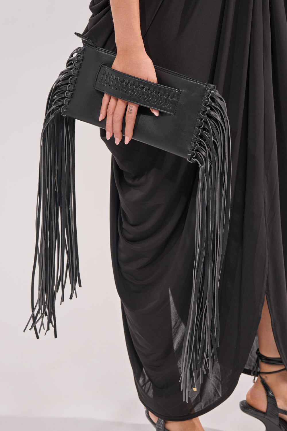 FINER THINGS FRINGE CLUTCH