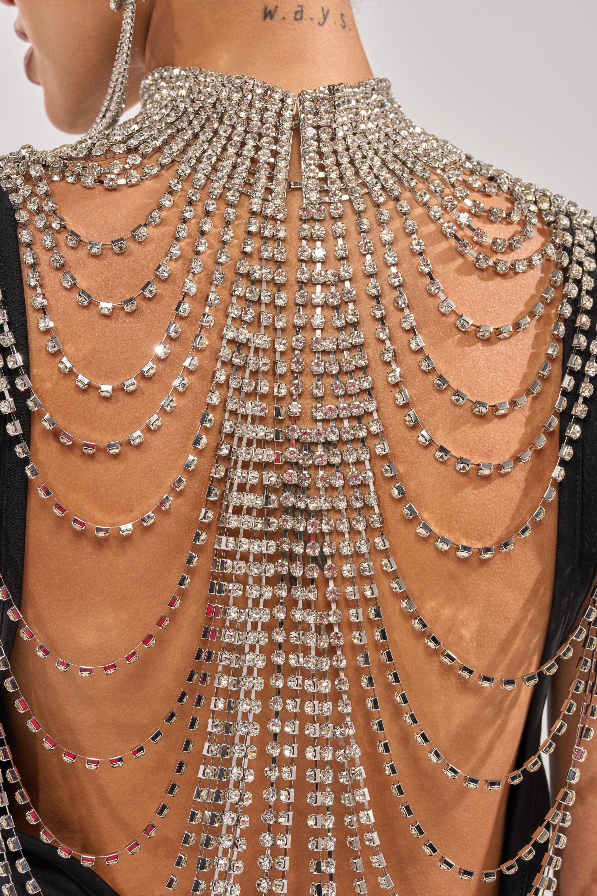 ONE OF ONE RHINESTONE SLEEVELESS TEE IN BLACK