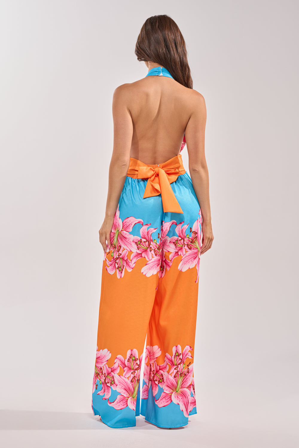 ON VACA TIME HALTER FLORAL PRINT JUMPSUIT