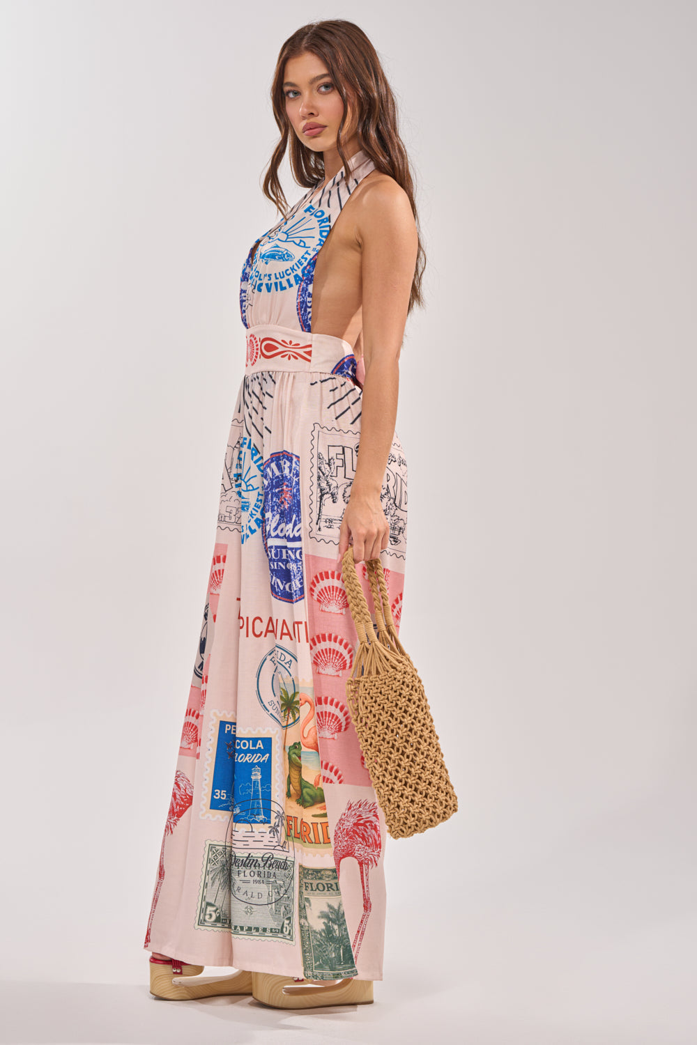 CATCH YOU LATER HALTER PRINTED JUMPSUIT