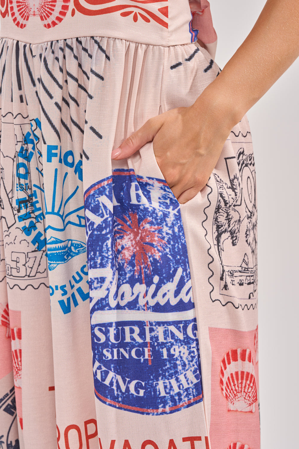 CATCH YOU LATER HALTER PRINTED JUMPSUIT