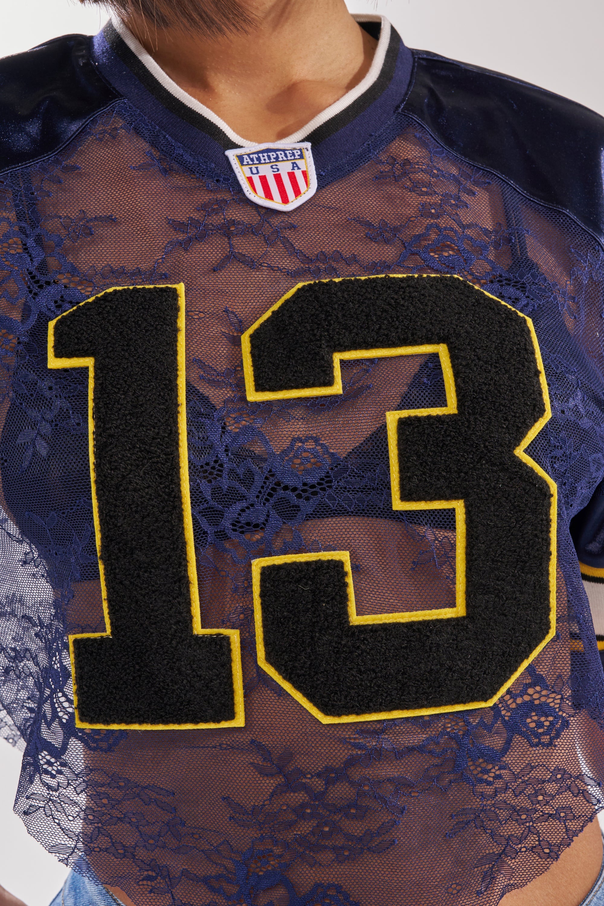LUCKY LACE JERSEY TOP IN NAVY