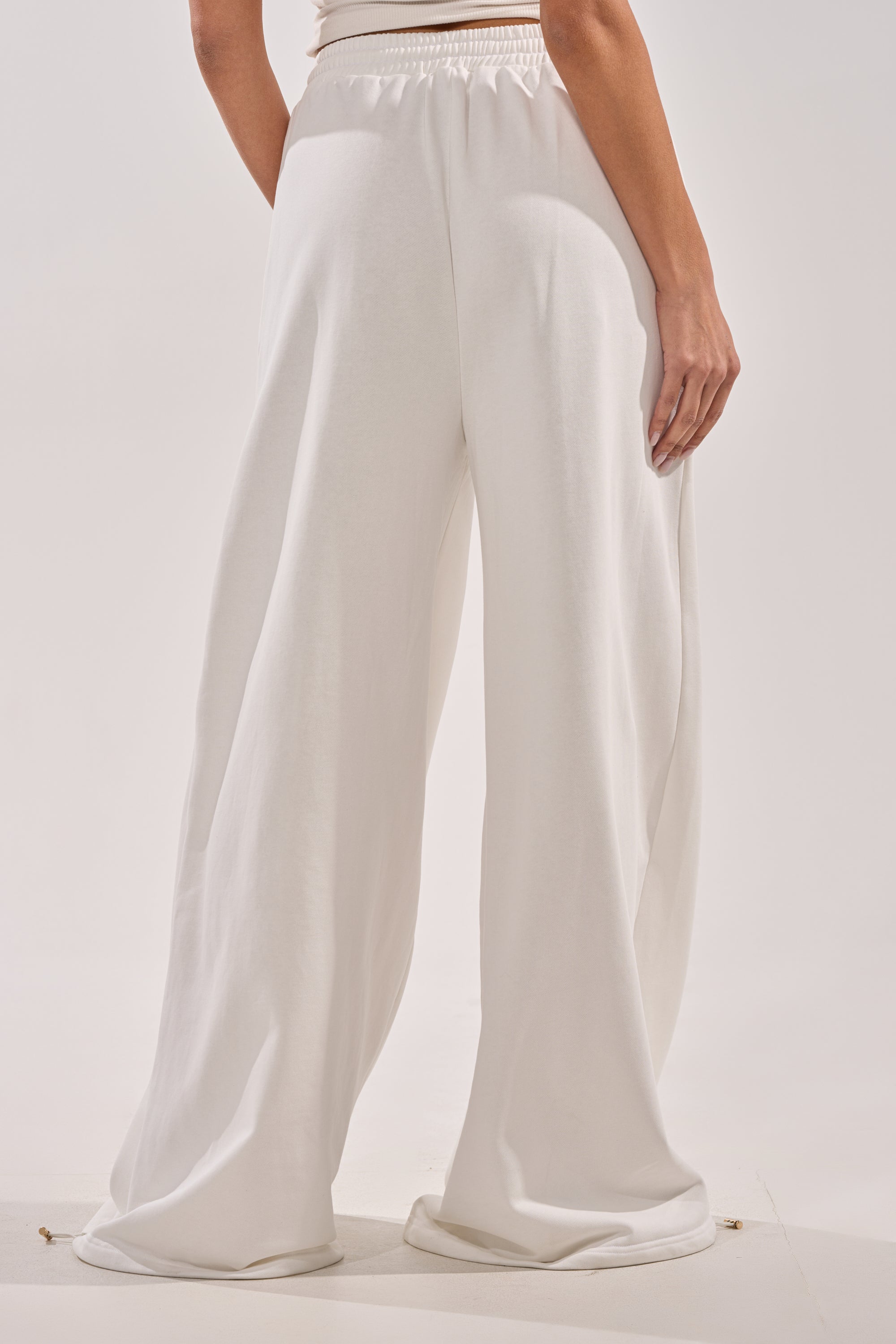 THROUGH THE NIGHT WIDE LEG SWEATPANT WITH HOLES IN WHITE