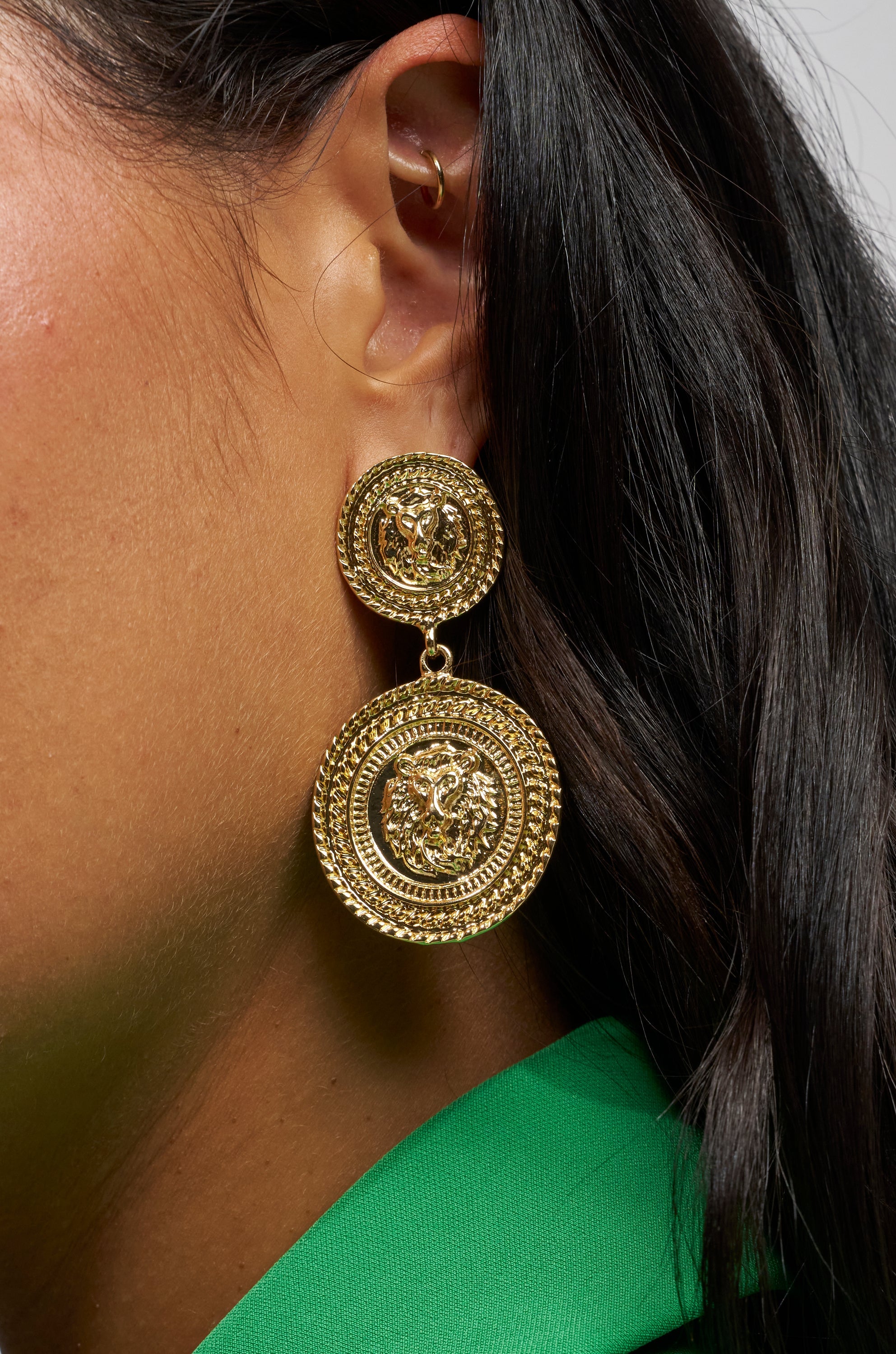 ABOUT THAT COIN EARRING