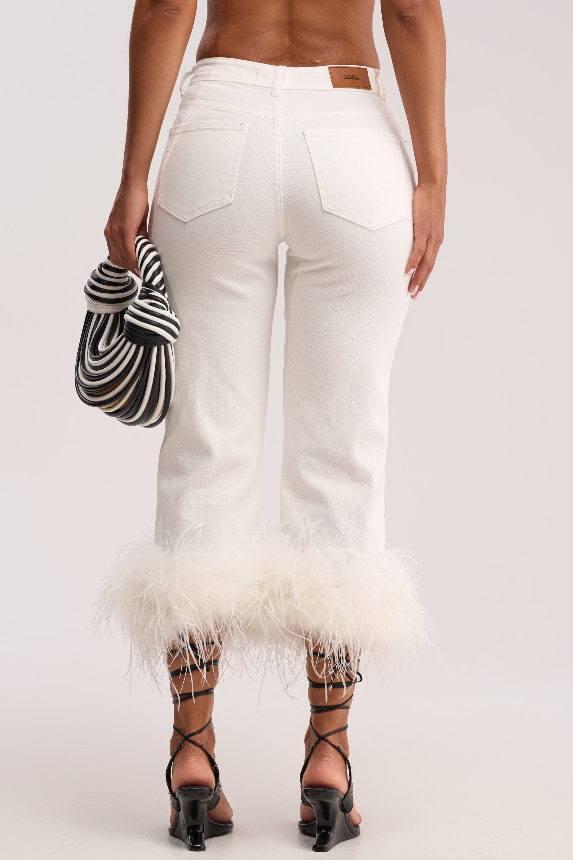 TRIPPY LIKE ME DENIM CAPRI WITH FEATHER