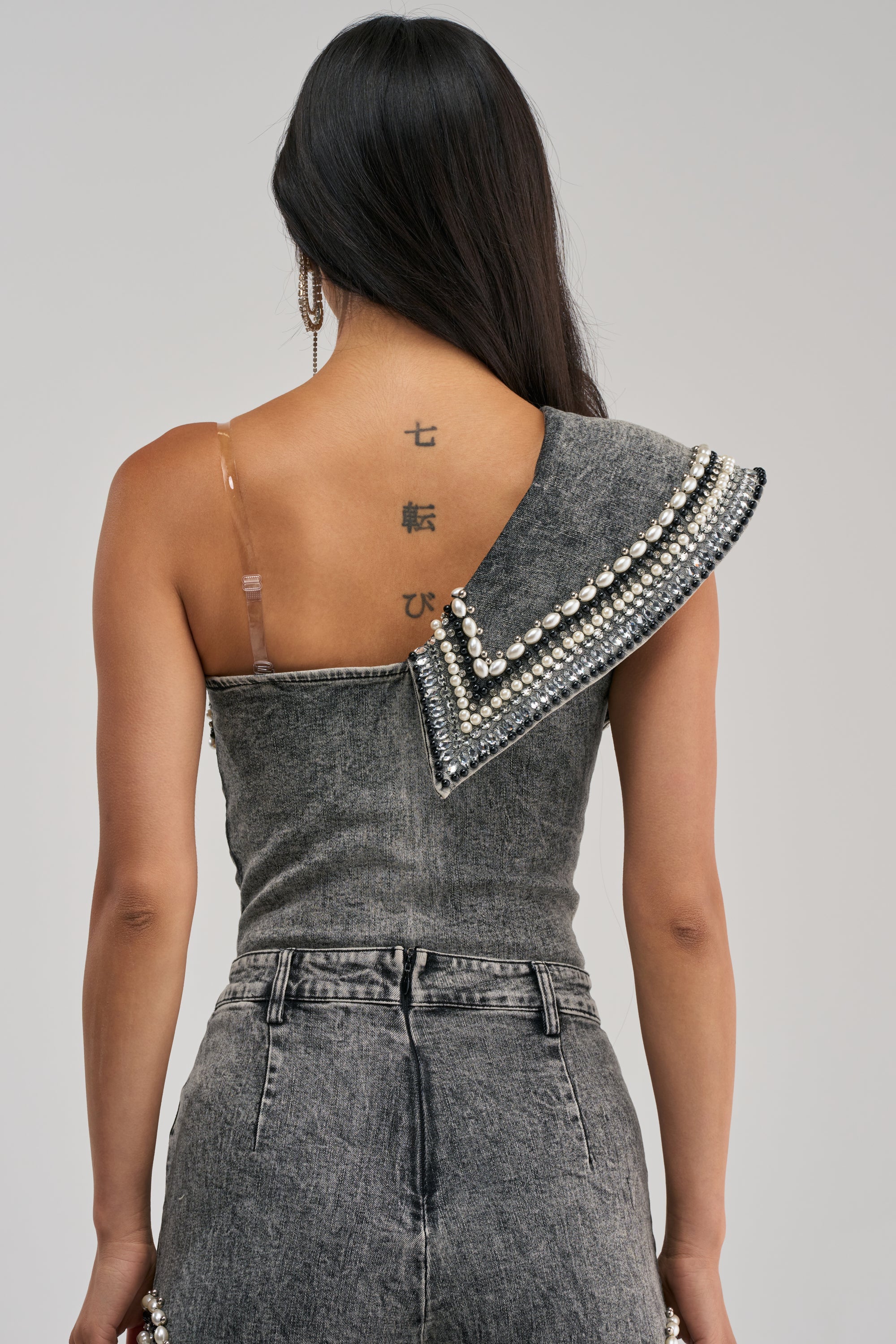 LUXURIOUS DENIM ASYMMETRICAL PEARL BODYSUIT IN GREY
